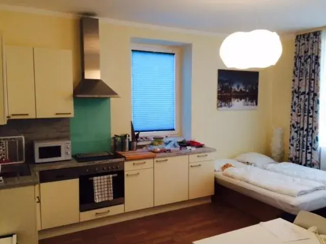 Kitchen or kitchenette, Bed in Adlerhof Kitchen or kitchenette, Bed in Adlerhof