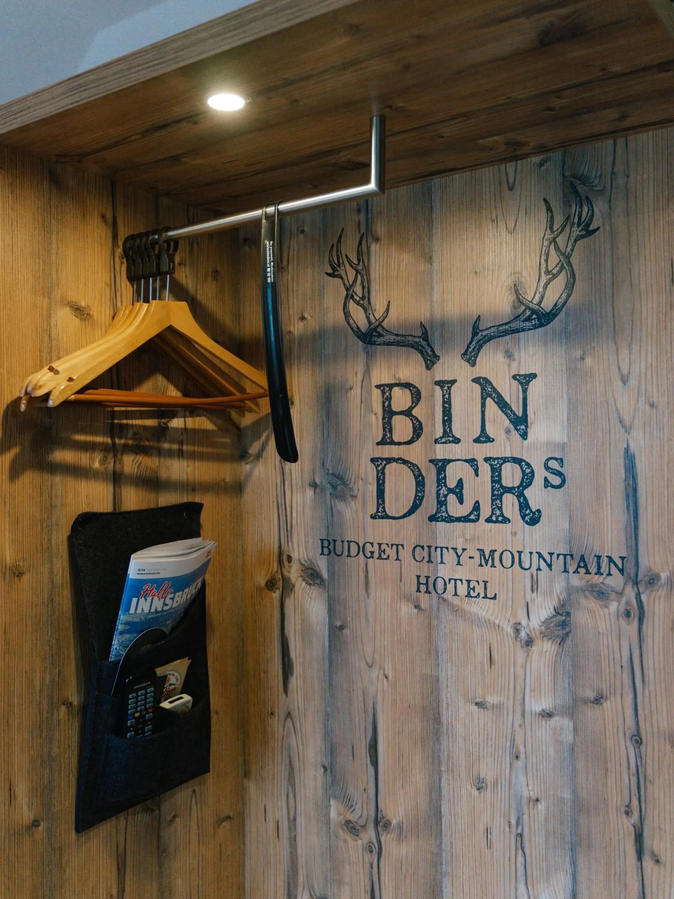 Property logo or sign in BinderS Budget City-Mountain Hotel