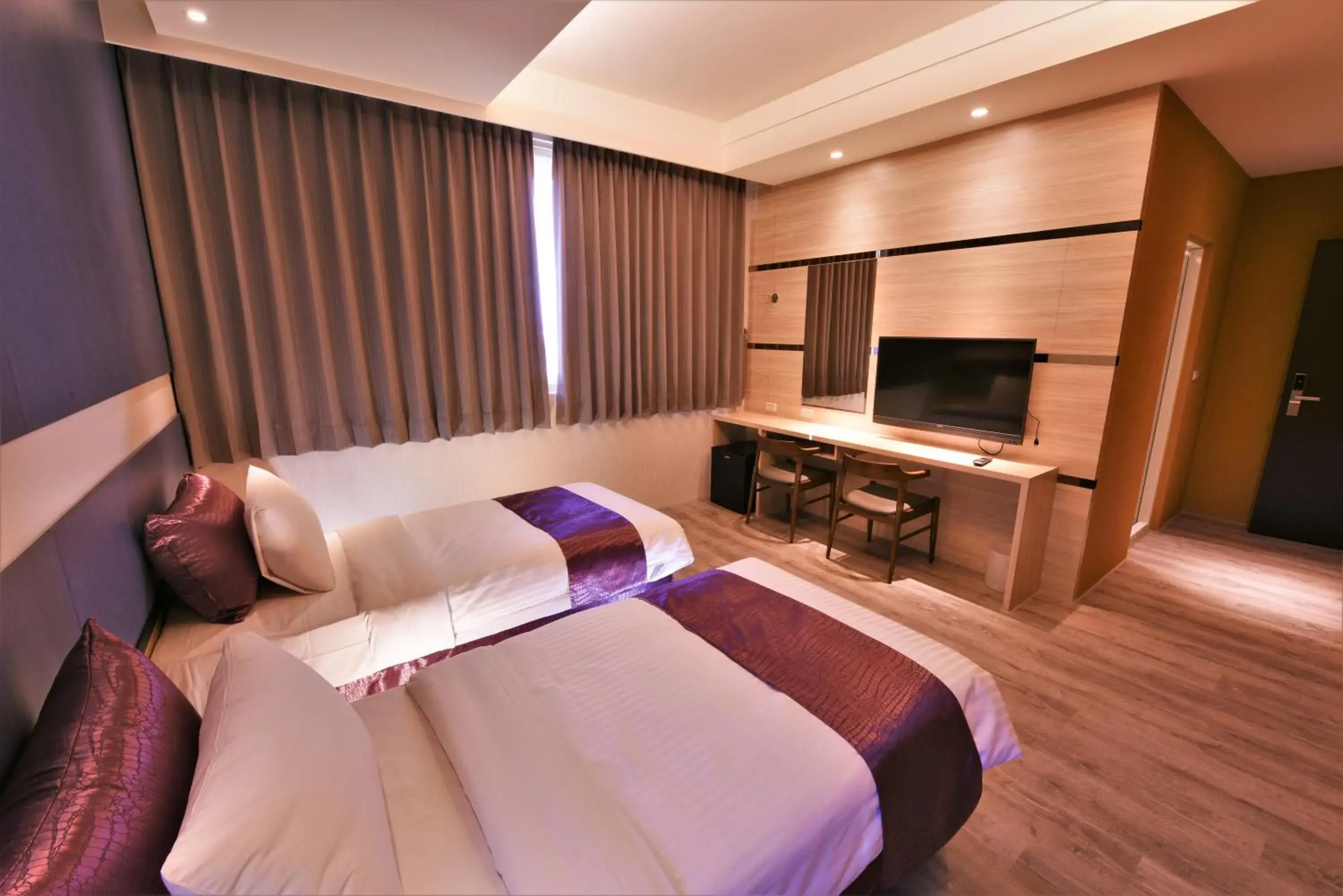 Bed in Yu Kun Tien Hotel Bed in Yu Kun Tien Hotel