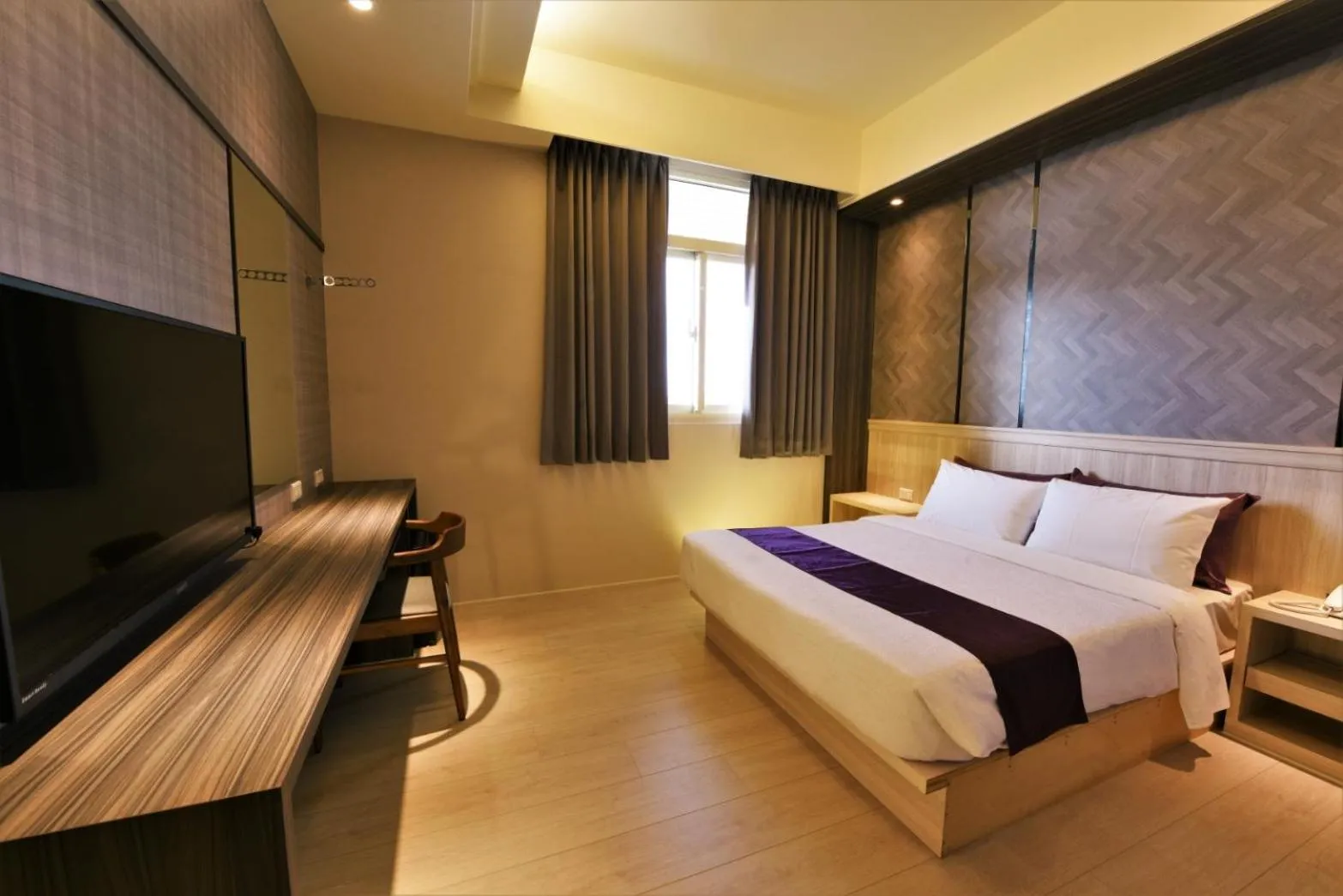 Bed in Yu Kun Tien Hotel