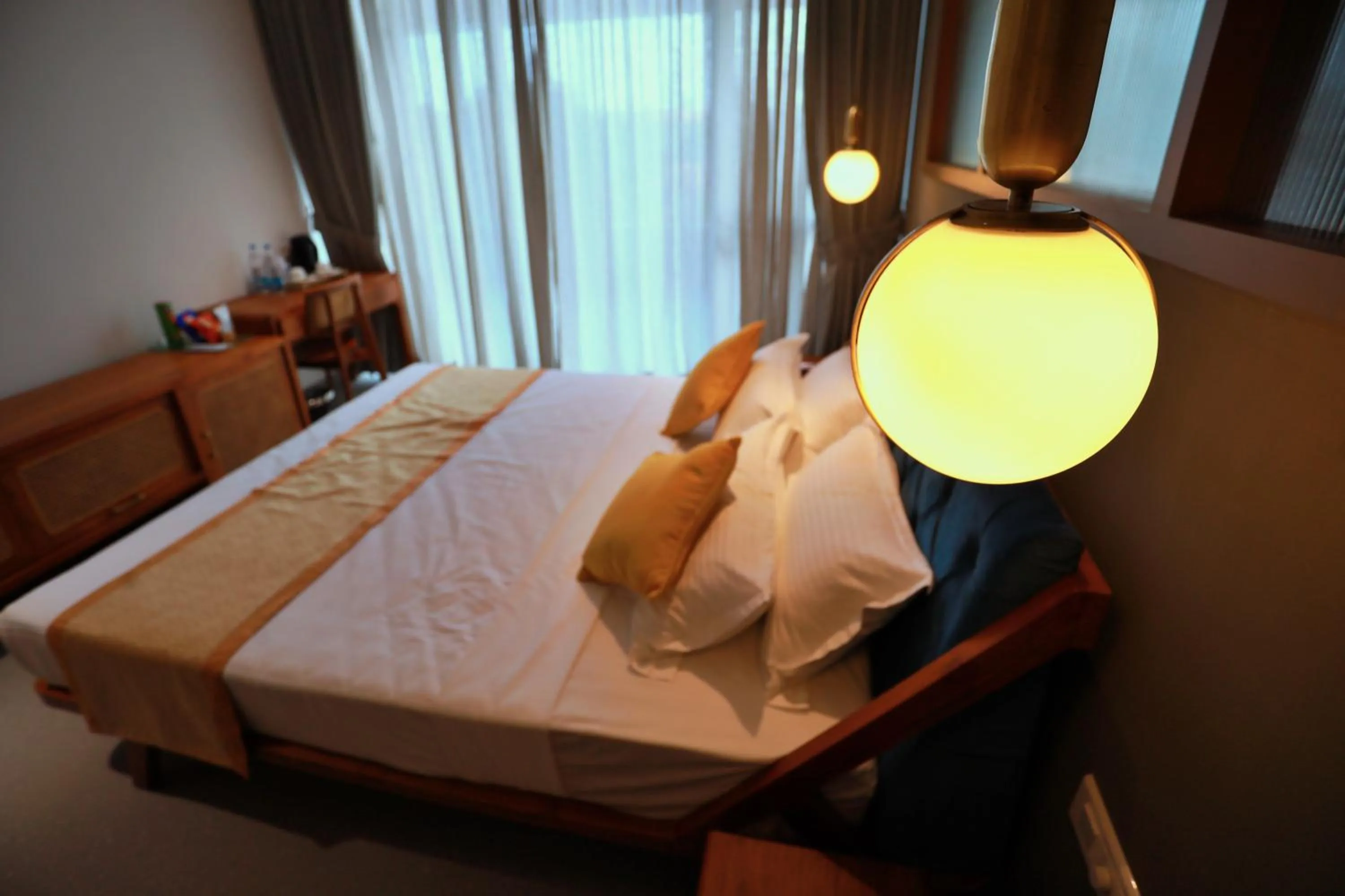 Patio, Bed in E.05 City Inn