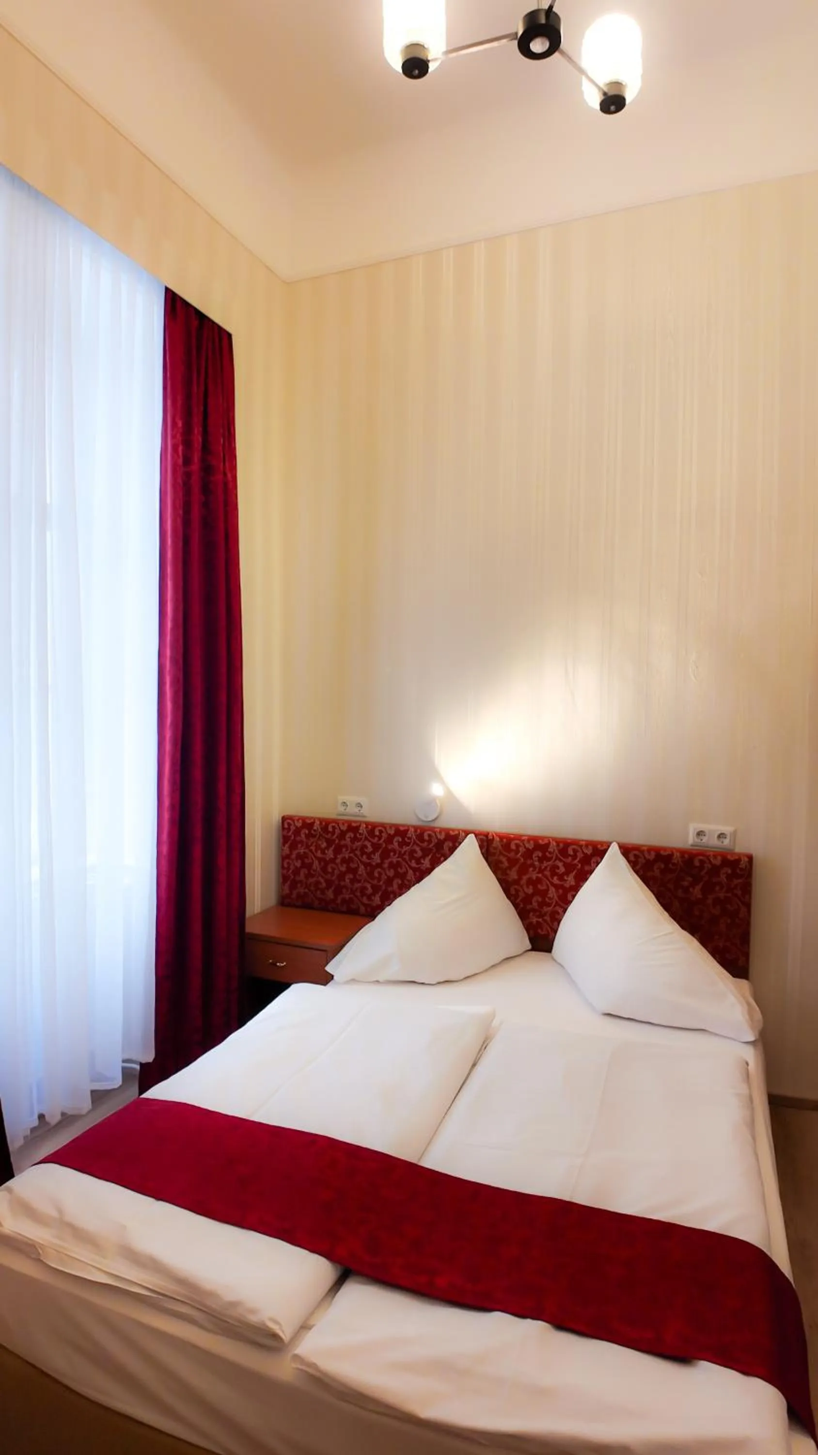 Bed in HPA Hotel Andreas