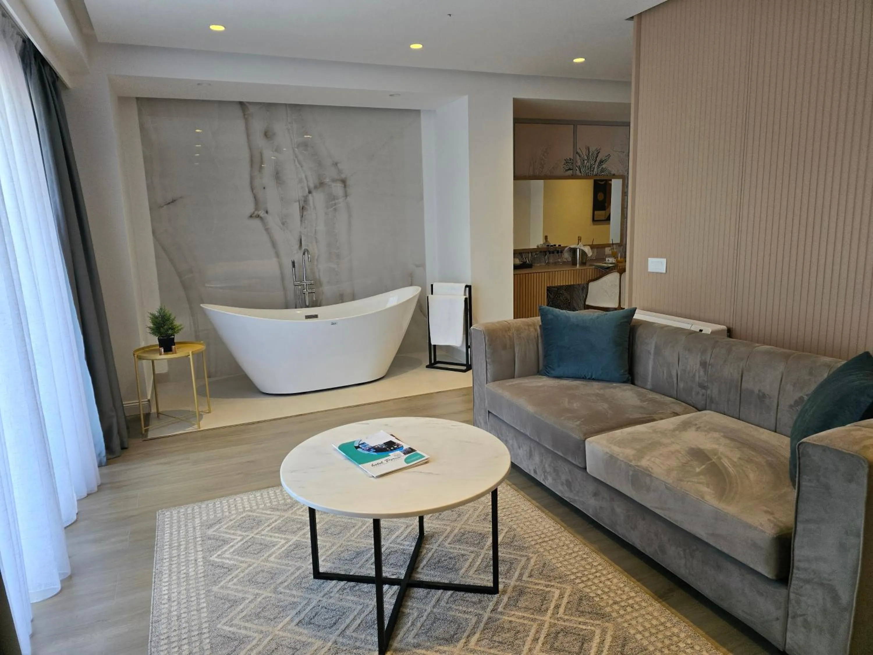 Seating area in Perla Hotel