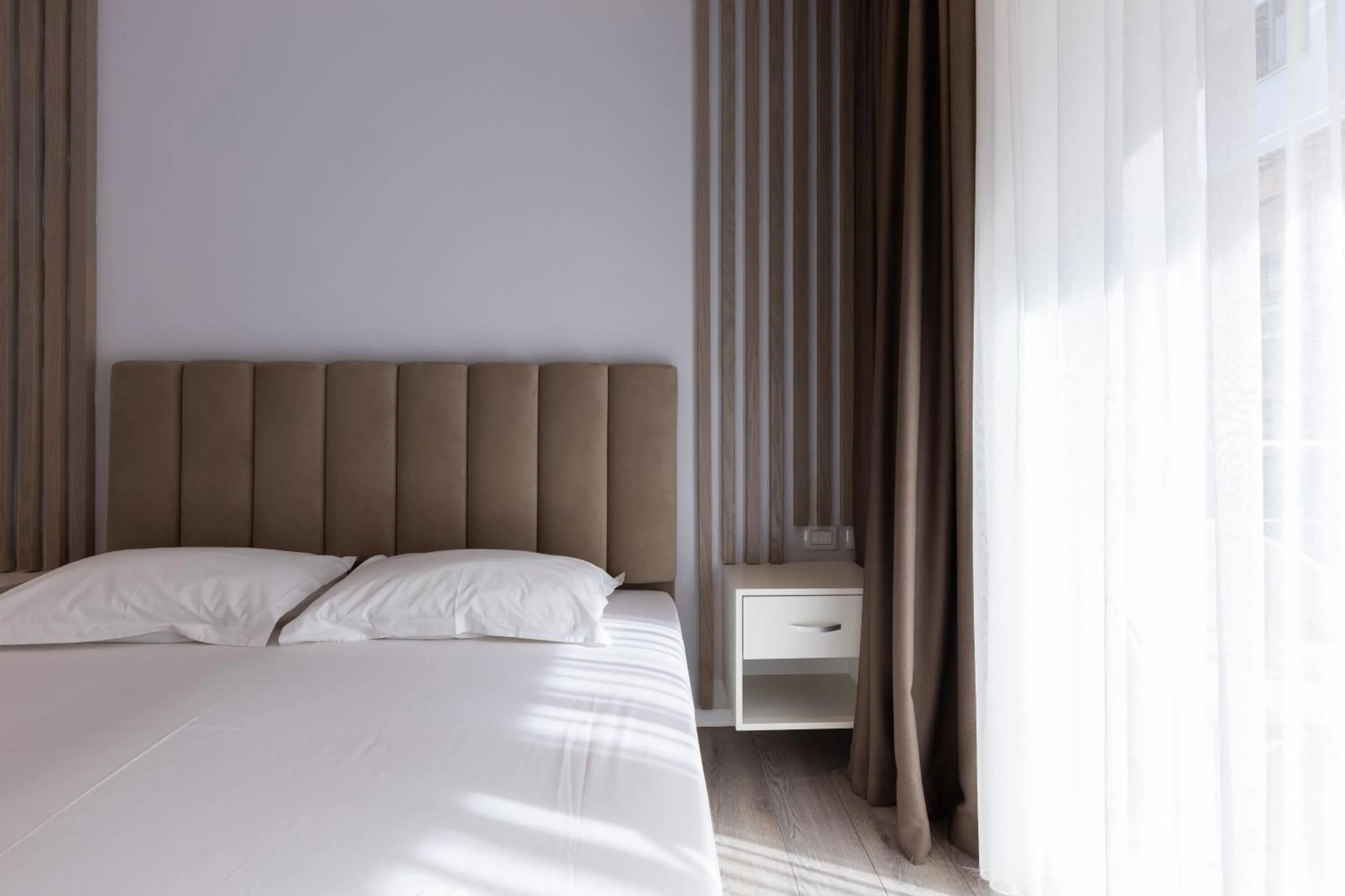 Bed in Broadway Boutique Hotel