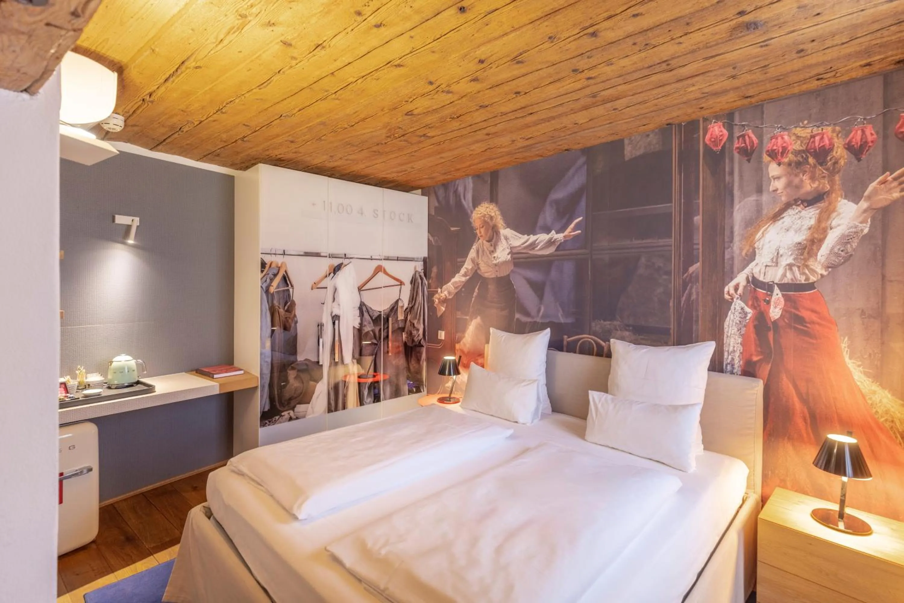 Bed in Small Luxury Hotel Goldgasse