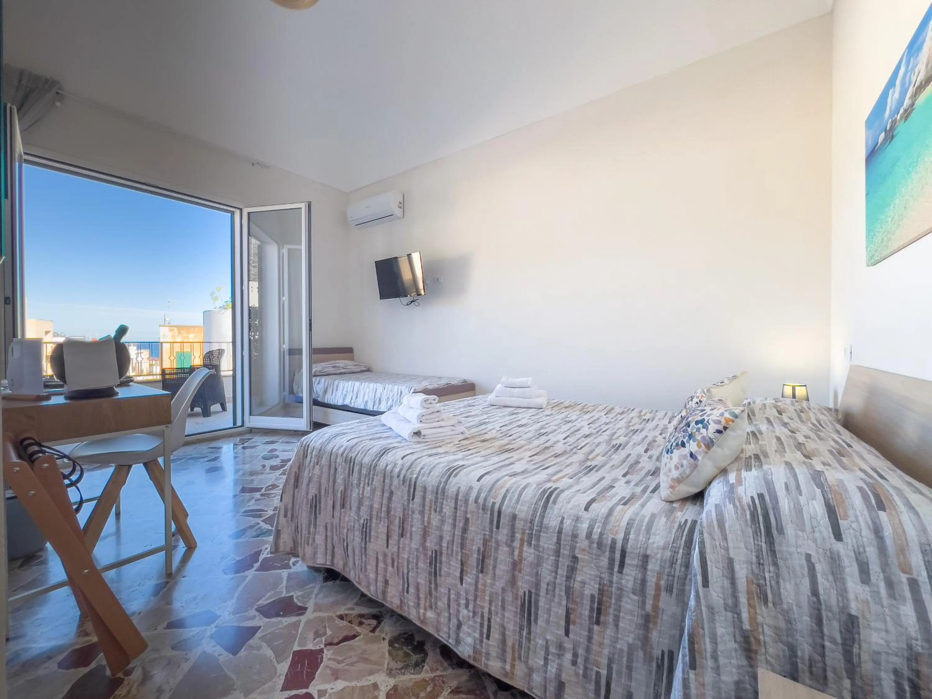 Bed in Ponente & Maestro Rooms