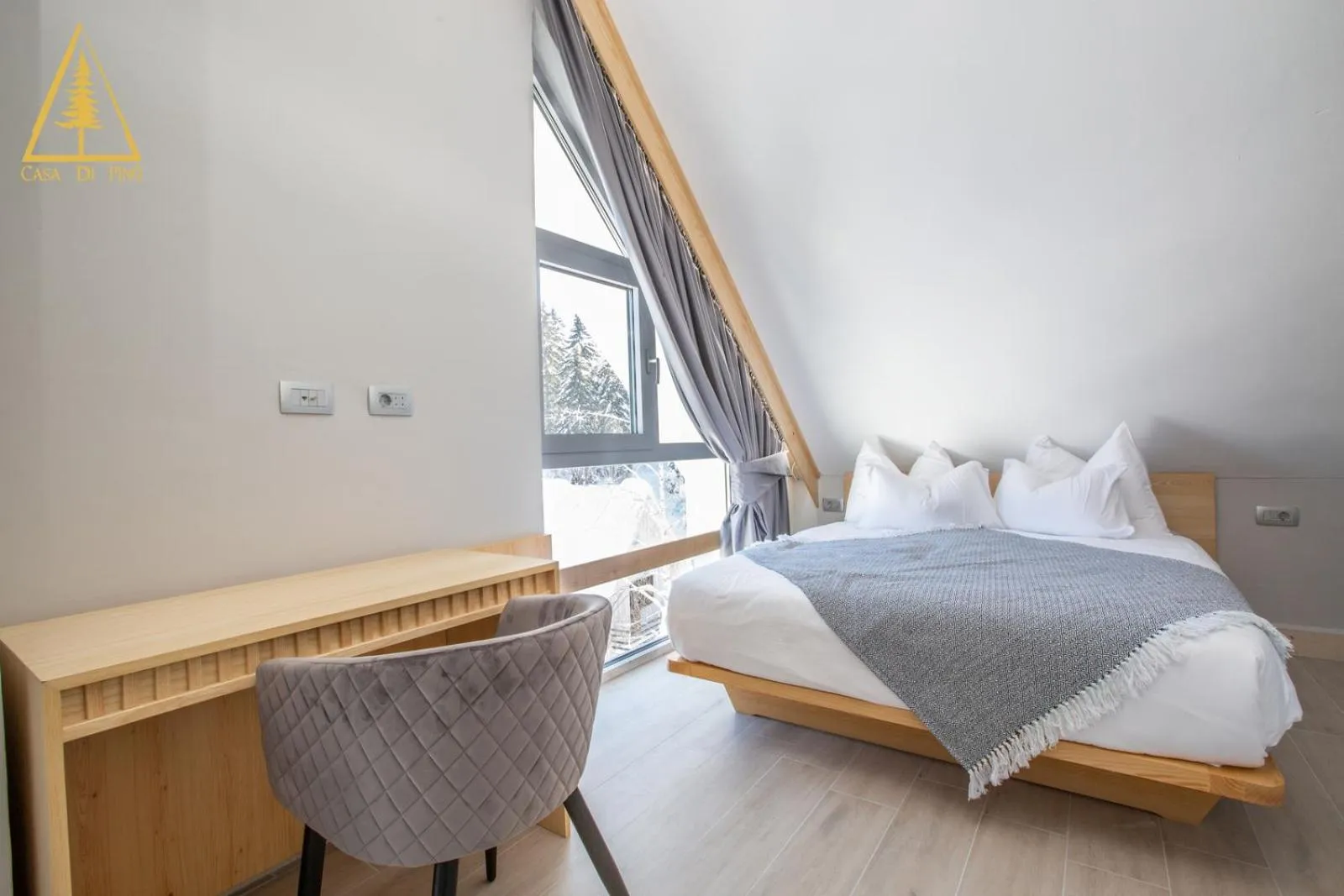 Bed in Casa di Pino EcoLodge Hotel