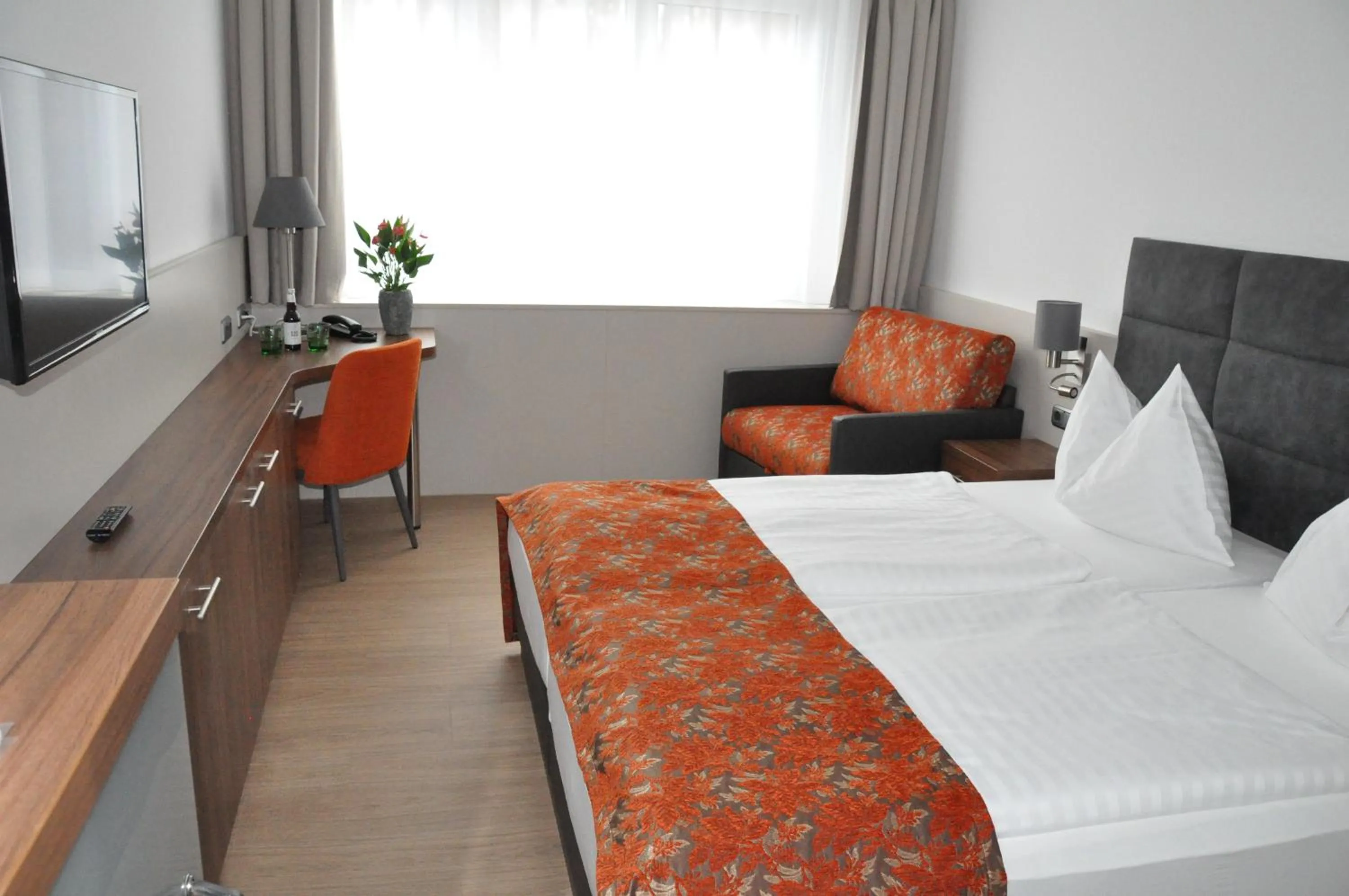 Photo of the whole room, Bed in Stadtoase Kolping Hotel