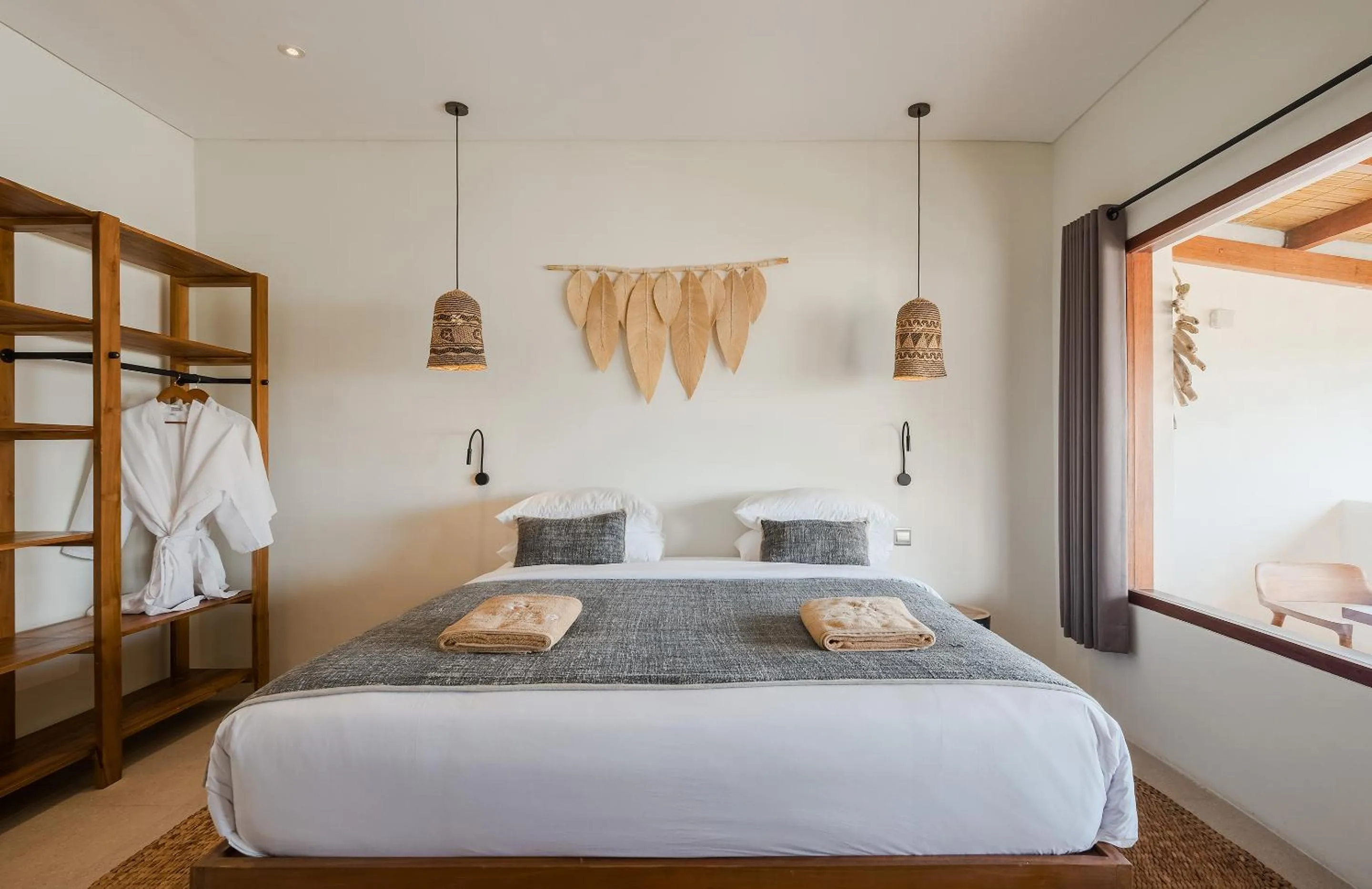 Bed in Amber Lombok Beach Resort