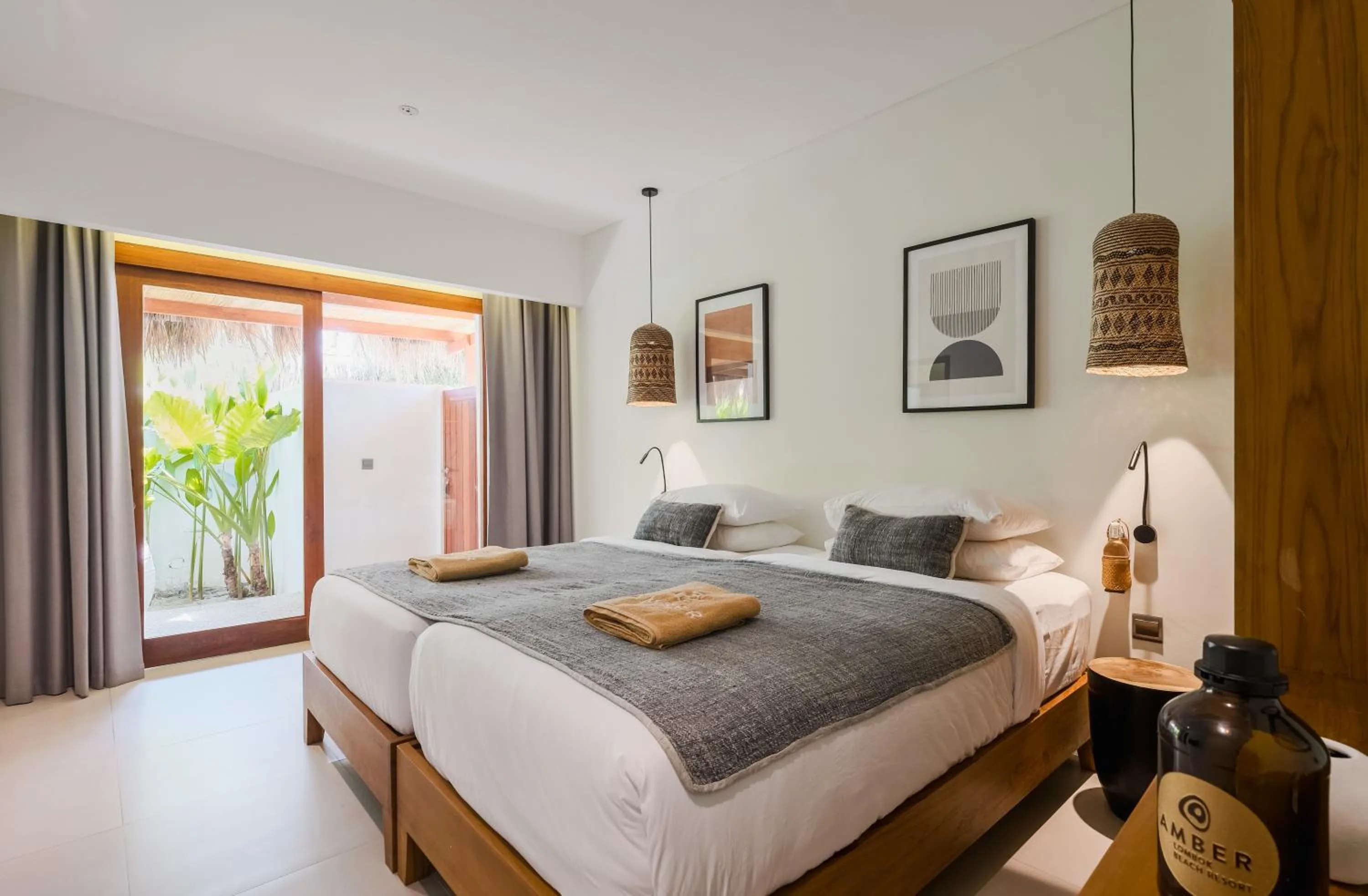 Bed in Amber Lombok Beach Resort