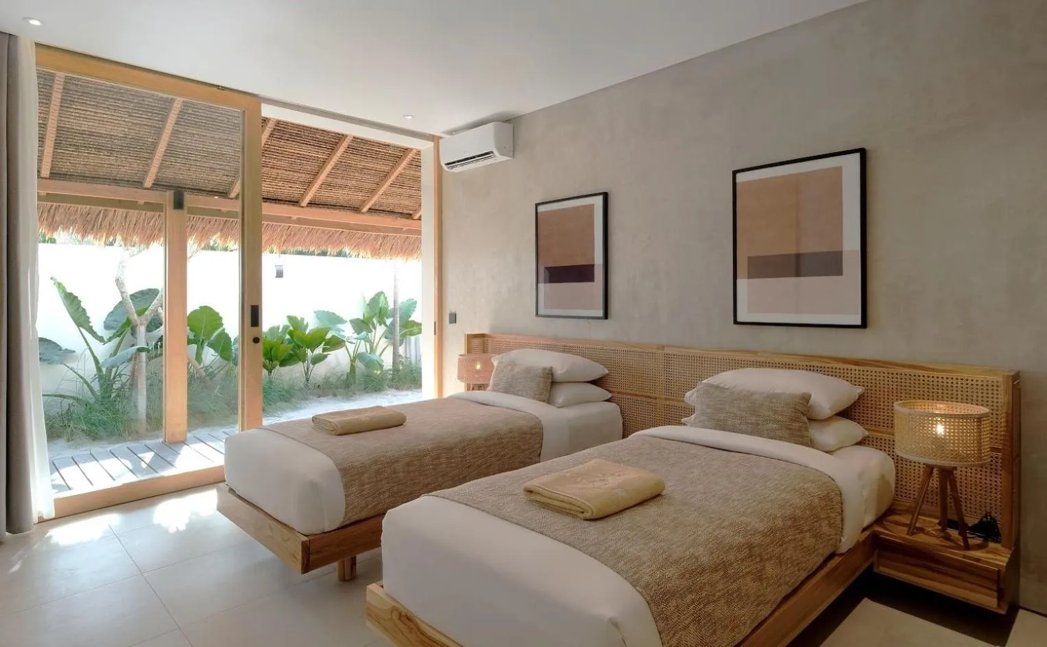 Bed in Amber Lombok Beach Resort