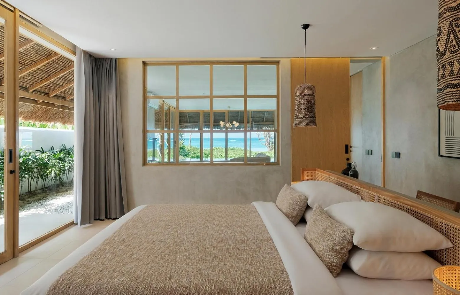 Bed in Amber Lombok Beach Resort
