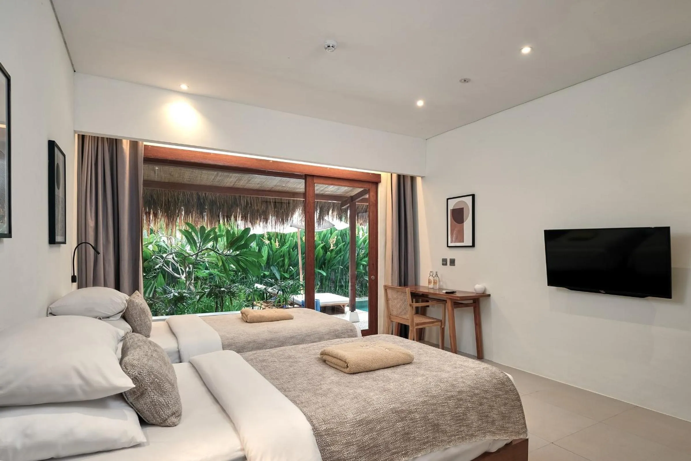 Bed in Amber Lombok Beach Resort