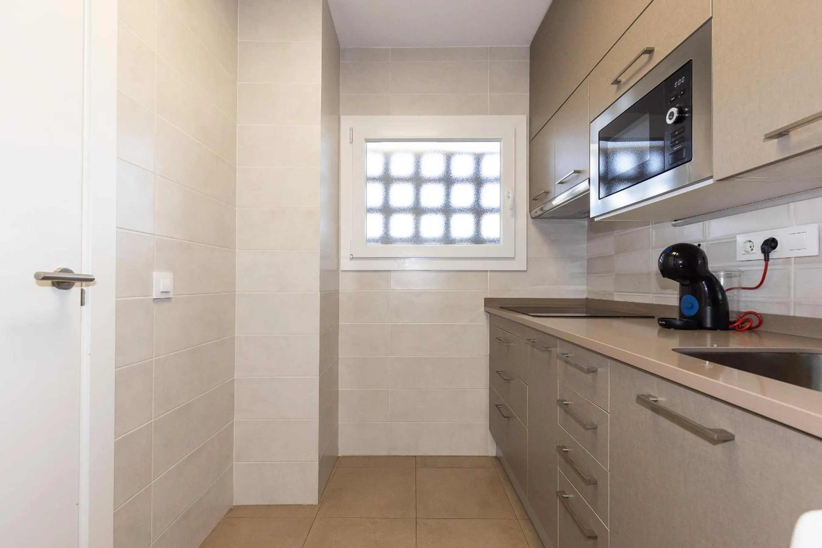 Kitchen or kitchenette in Rentalmar Murillo Plus