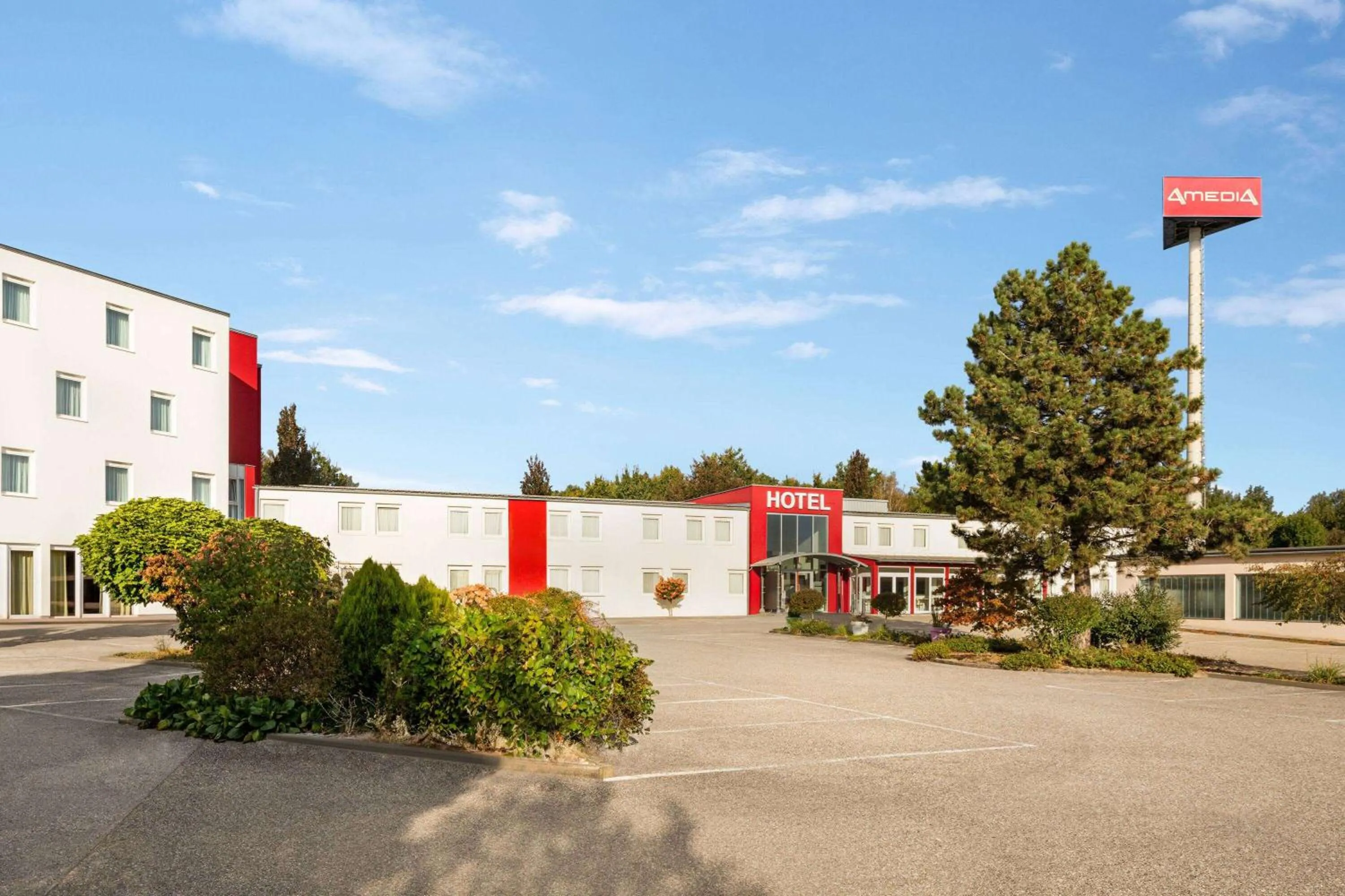 Property building in Amedia Express Sattledt, Trademark Collection by Wyndham