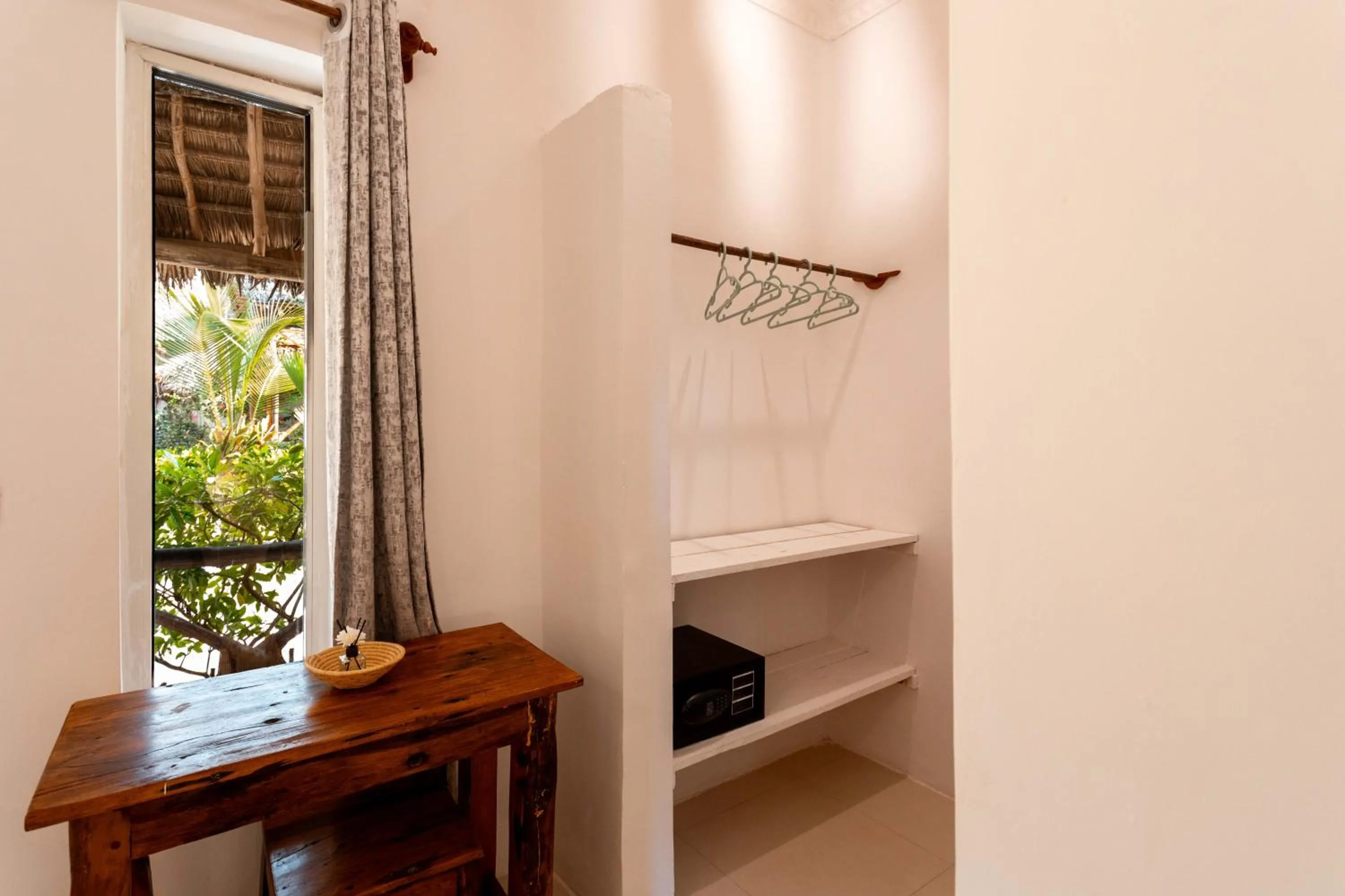 Photo of the whole room, Bed in Maisha Matamu Boutique