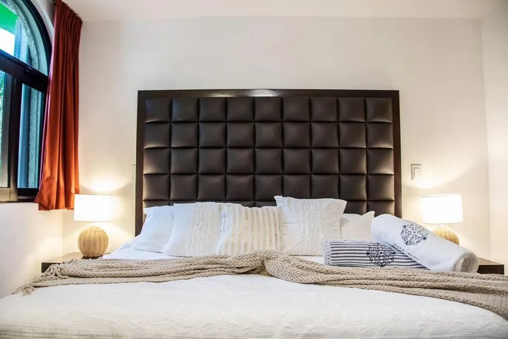 Bed in Depa Bliss · Luxurious getaway at beach paradise Cancún