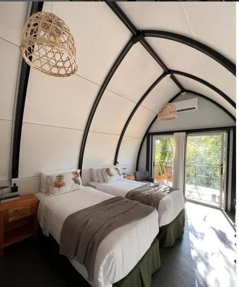 Bed in Botánica Iguazú The House Experience