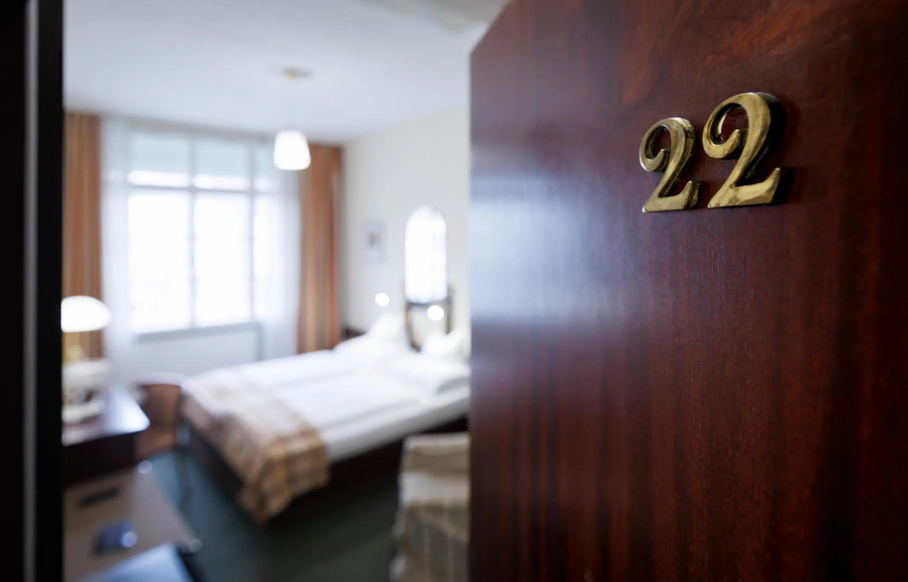 Photo of the whole room, Bed in Continental Hotel-Pension Photo of the whole room, Bed in Continental Hotel-Pension