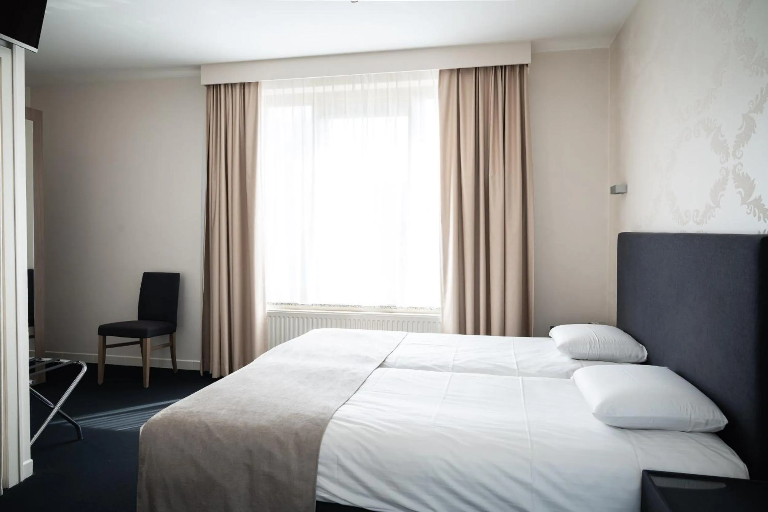 Bed in Hotel Essenza