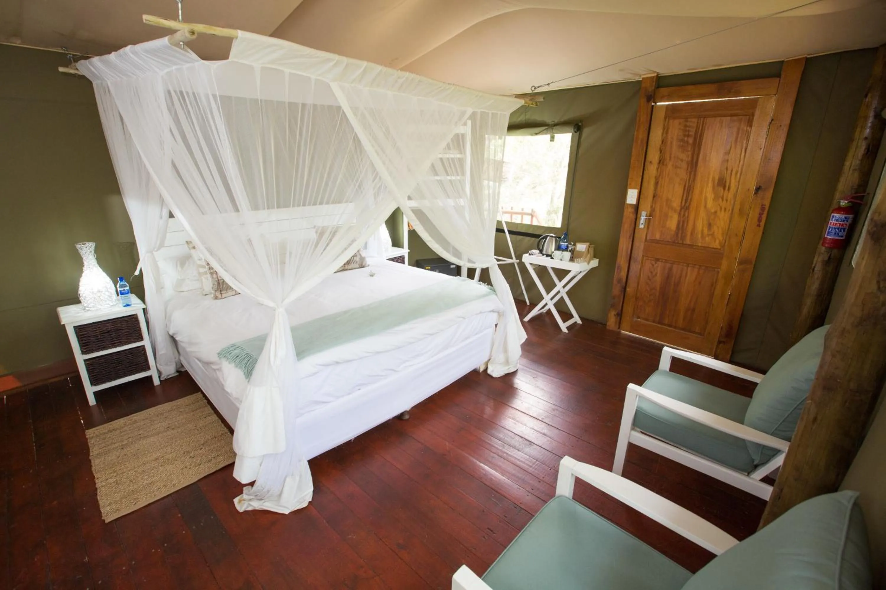 Bed in Ngama Tented Safari Lodge