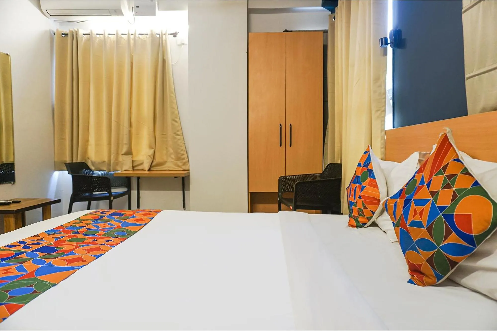 Bed in FabHotel Aura Homes - Nr Khandoba Mandir