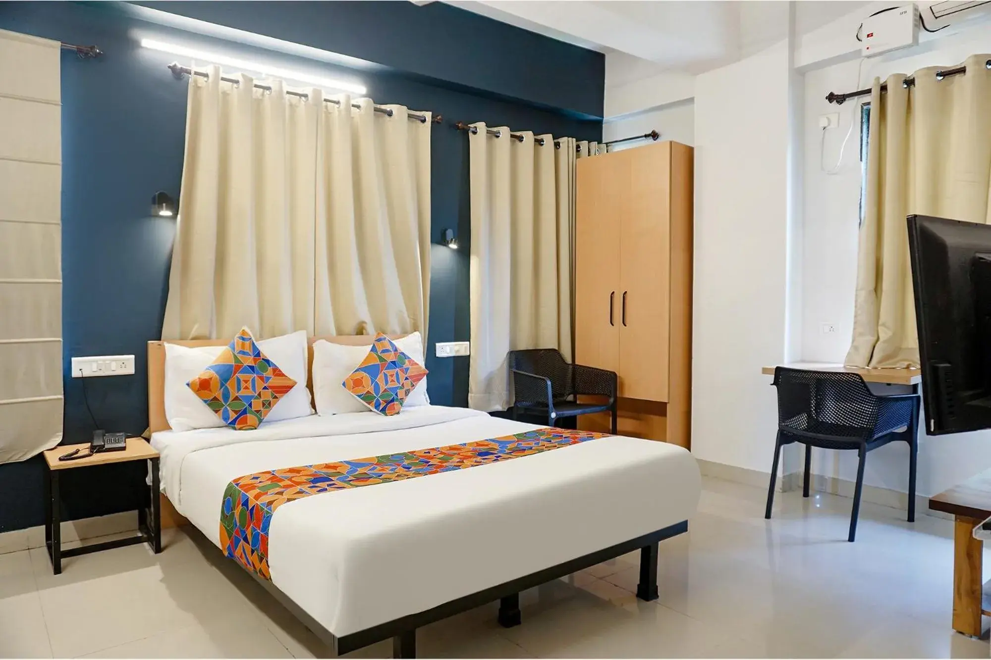 Bed in FabHotel Aura Homes - Nr Khandoba Mandir Bed in FabHotel Aura Homes - Nr Khandoba Mandir