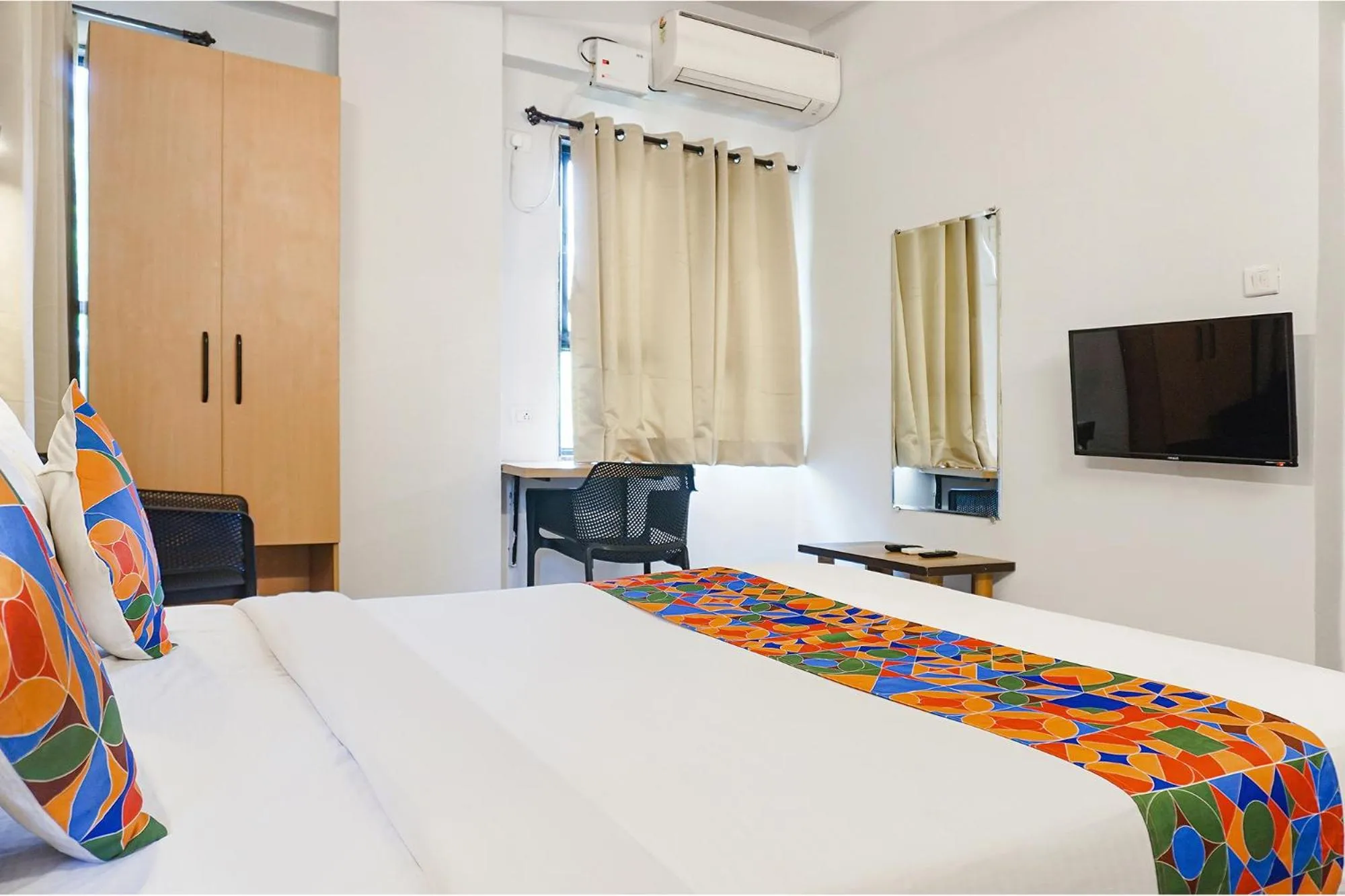 Bed in FabHotel Aura Homes - Nr Khandoba Mandir