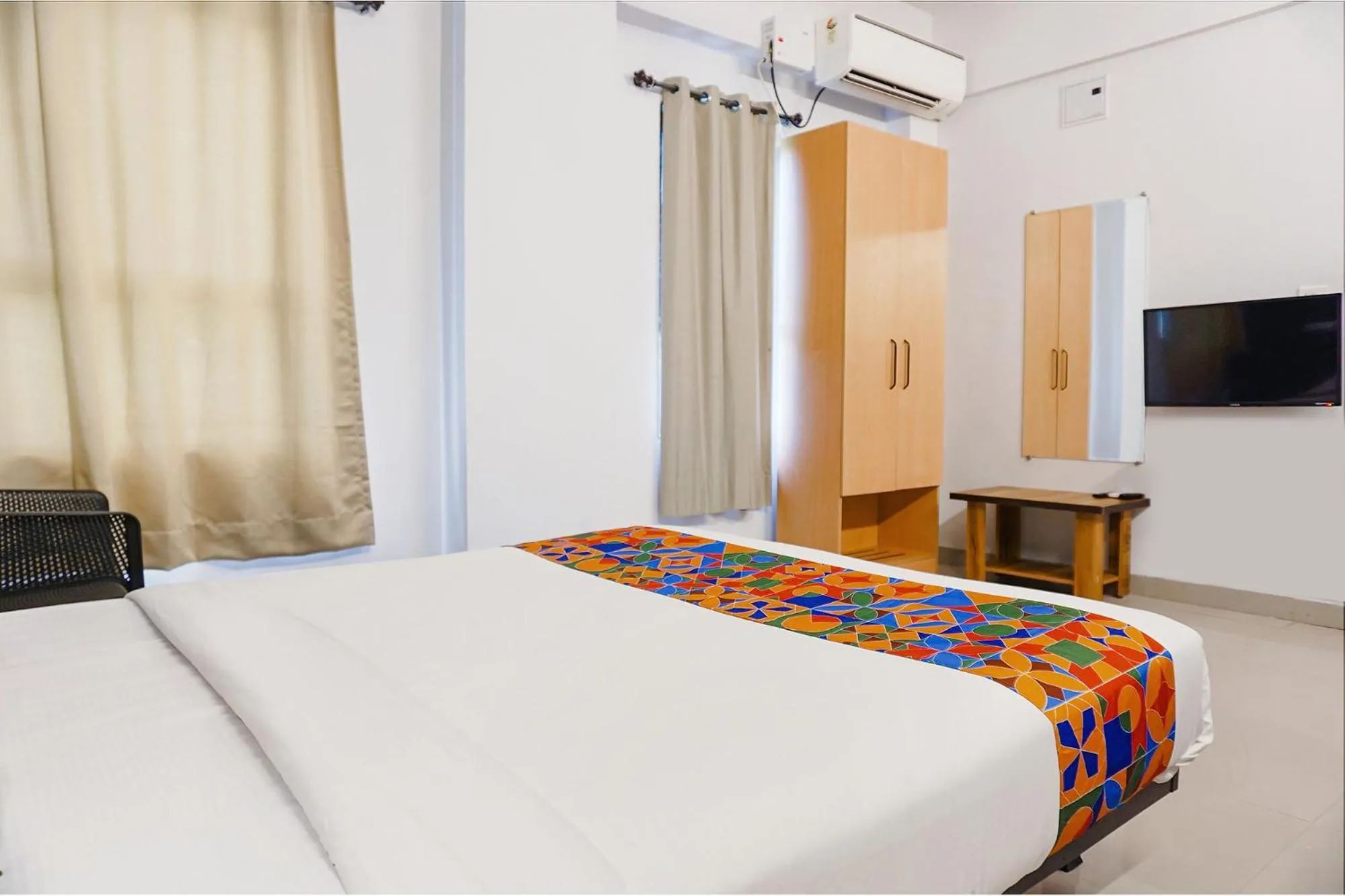 Bed in FabHotel Aura Homes - Nr Khandoba Mandir