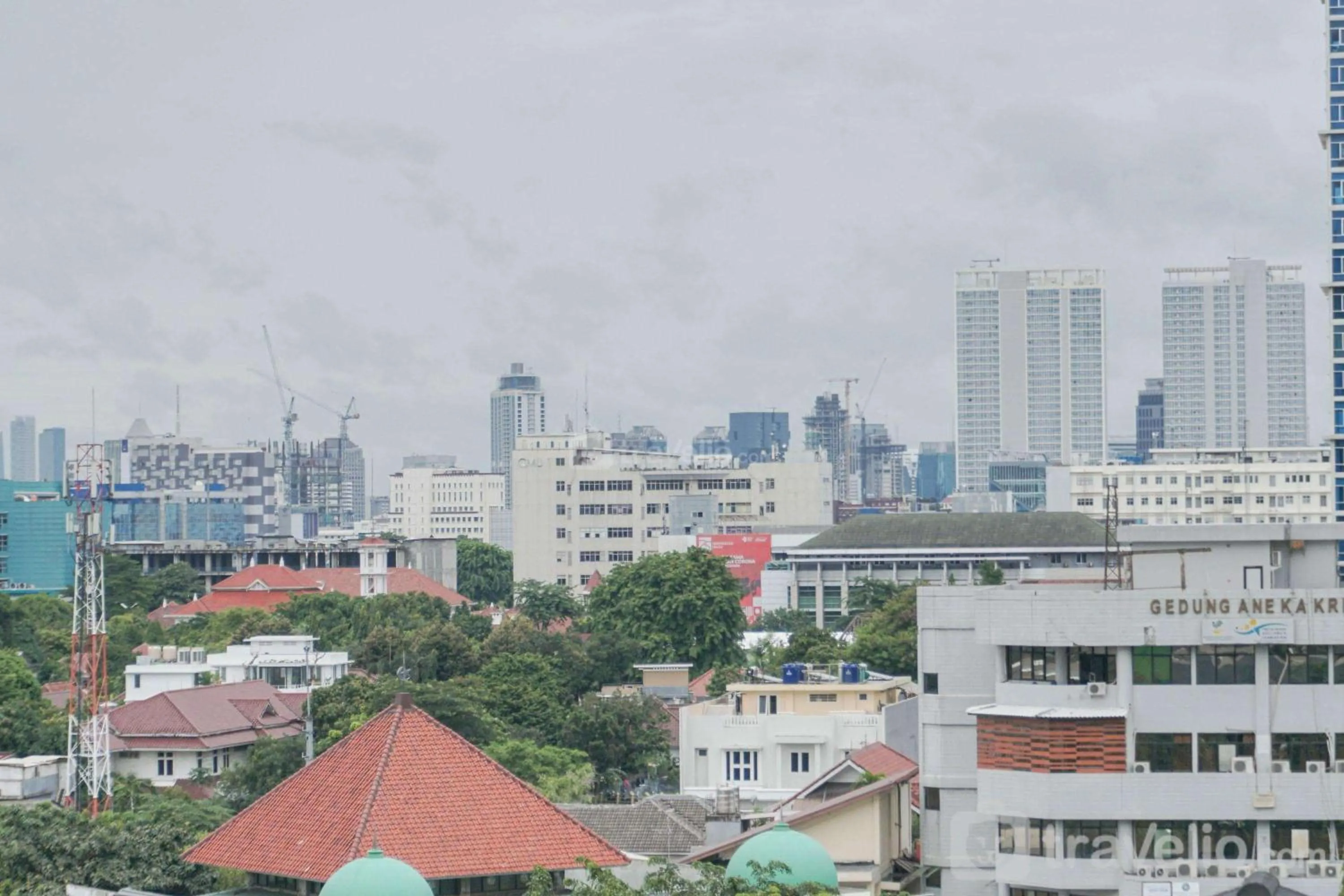 Bed in Beautiful and Comfy 2BR Menteng Square Apartment By Travelio