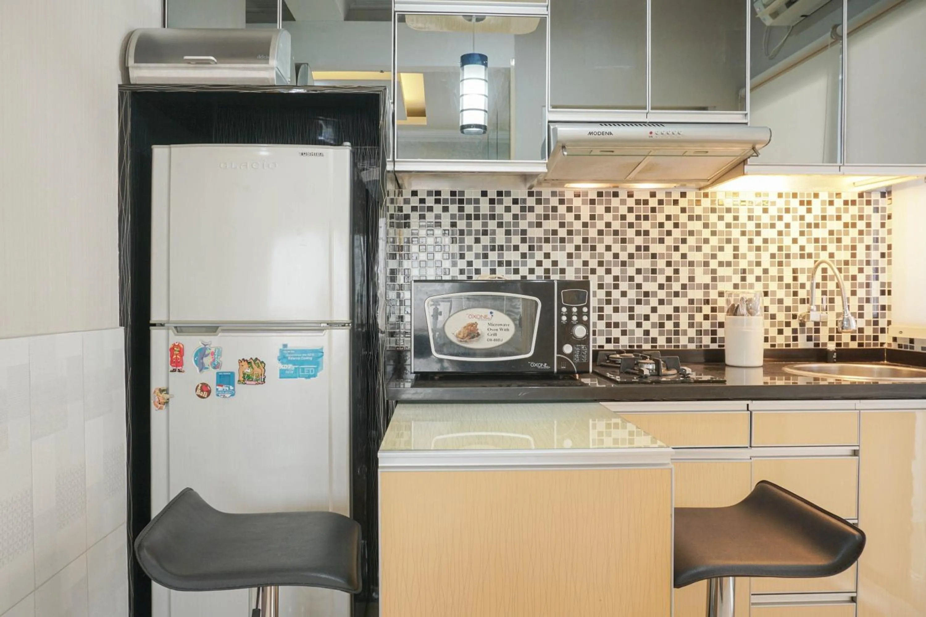 Dining area in Beautiful and Comfy 2BR Menteng Square Apartment By Travelio