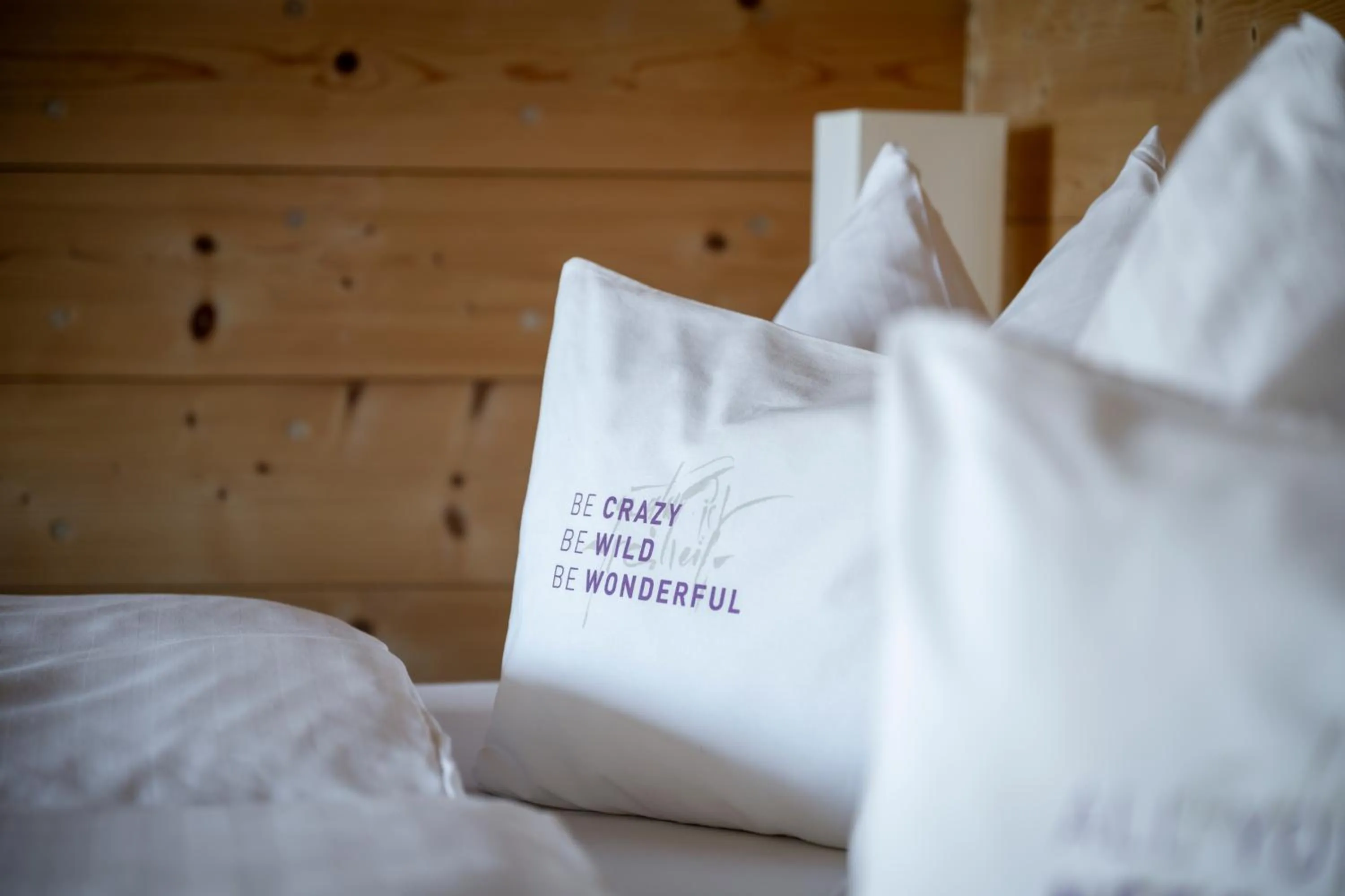 Photo of the whole room, Bed in Holzhotel Forsthofalm