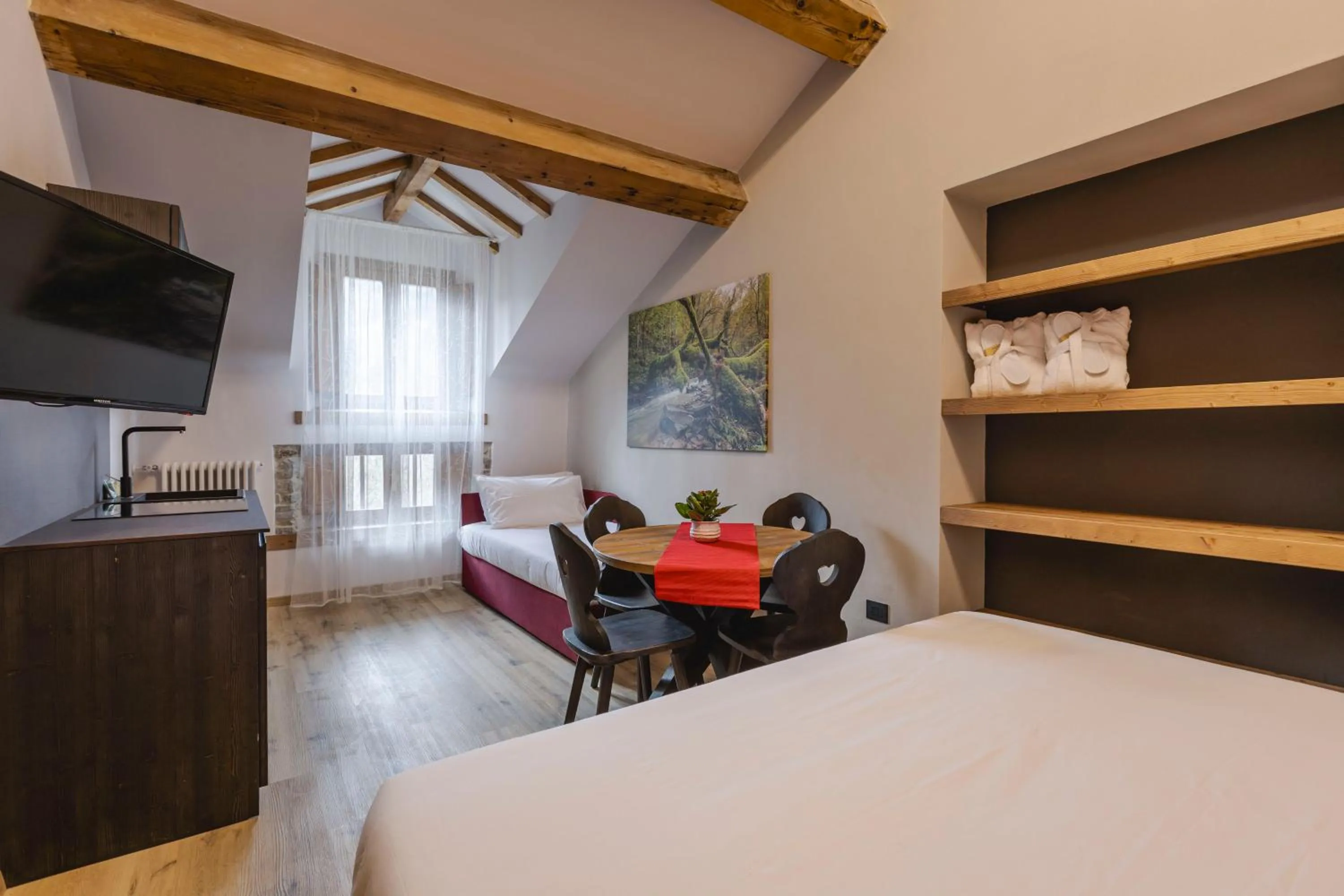 Living room, Bed in Granduca Mountain Wellness Apartments Campigna