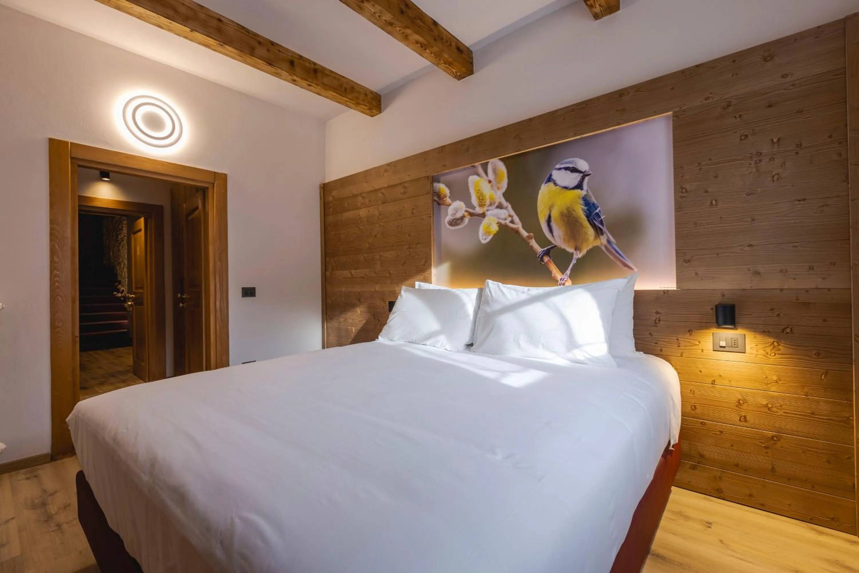 Bed in Granduca Mountain Wellness Apartments Campigna