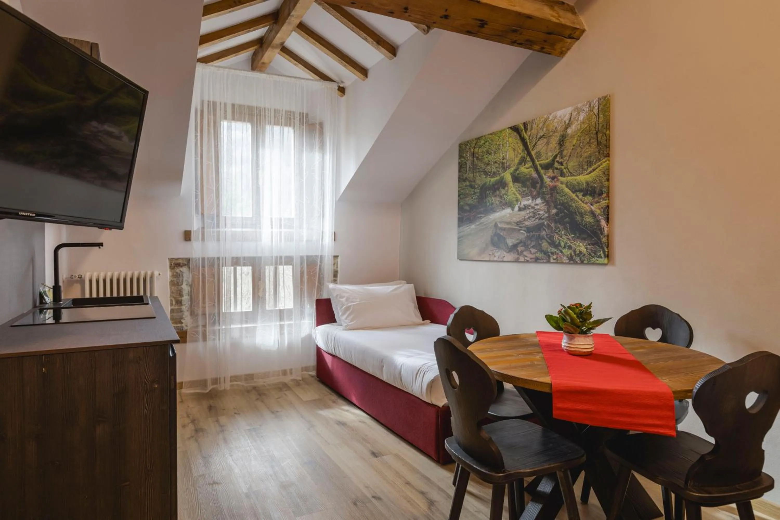 Kitchen or kitchenette, Bed in Granduca Mountain Wellness Apartments Campigna