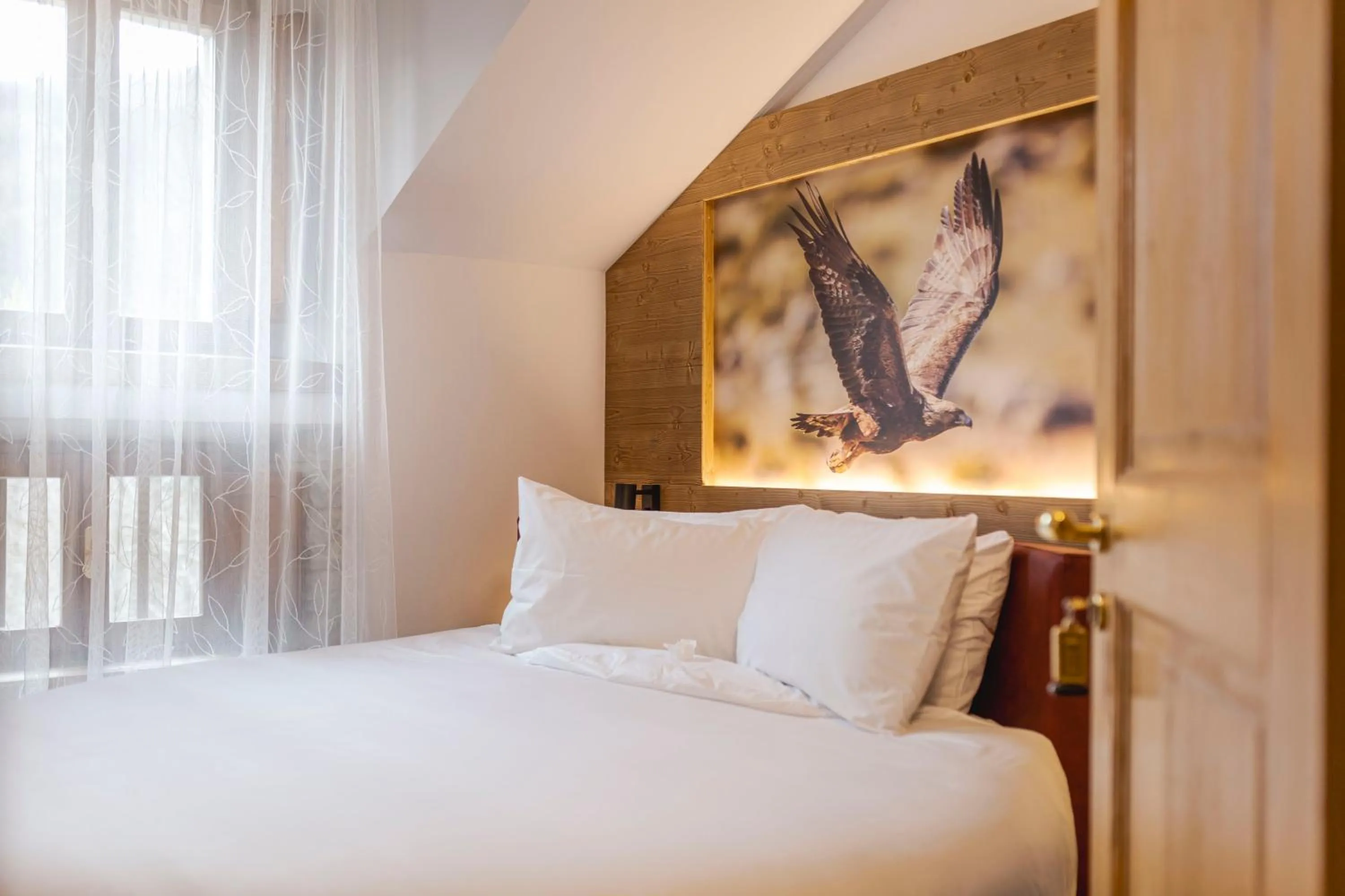 Bed in Granduca Mountain Wellness Apartments Campigna