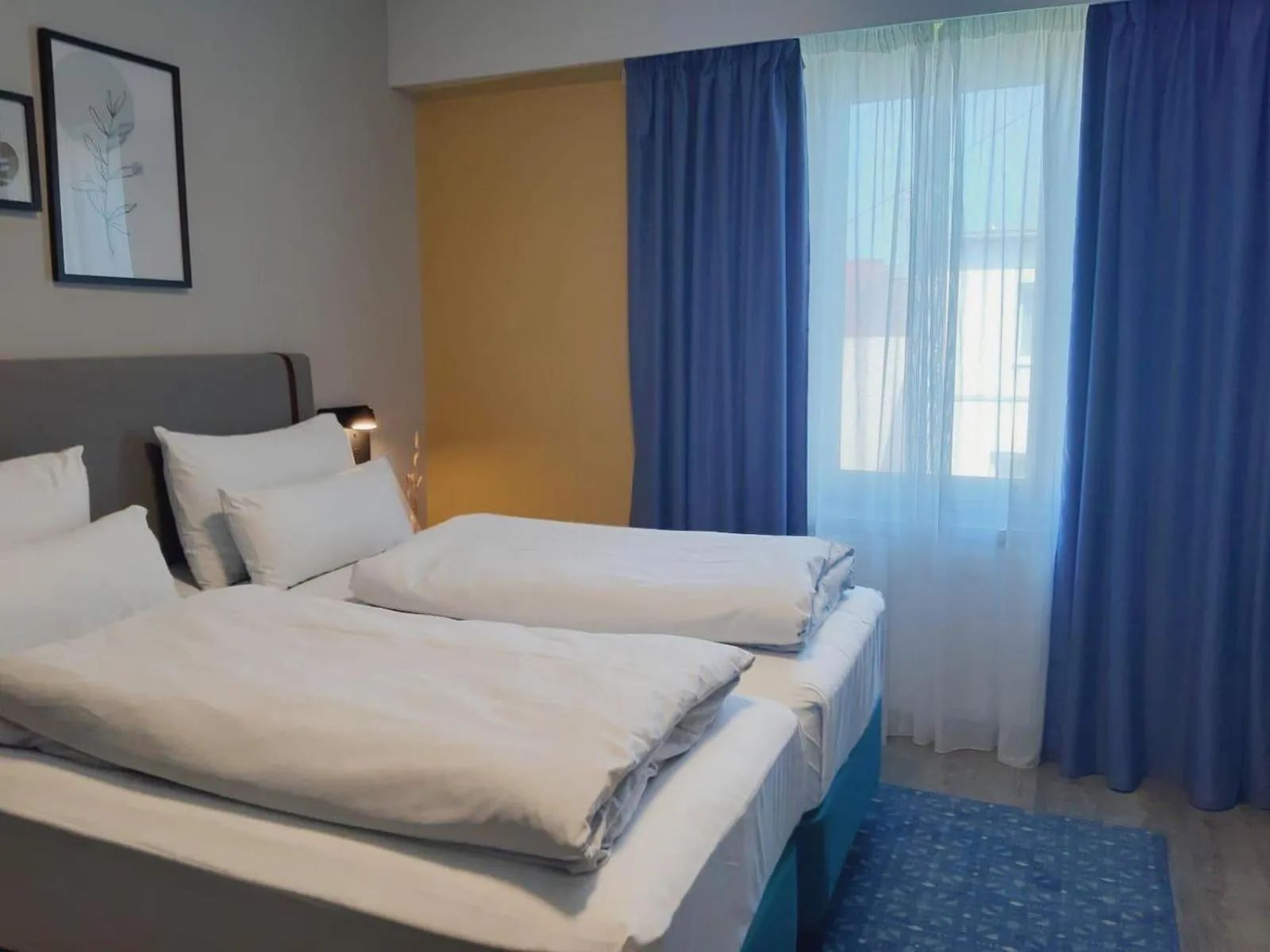 Photo of the whole room, Bed in Garner Hotel Vienna by IHG