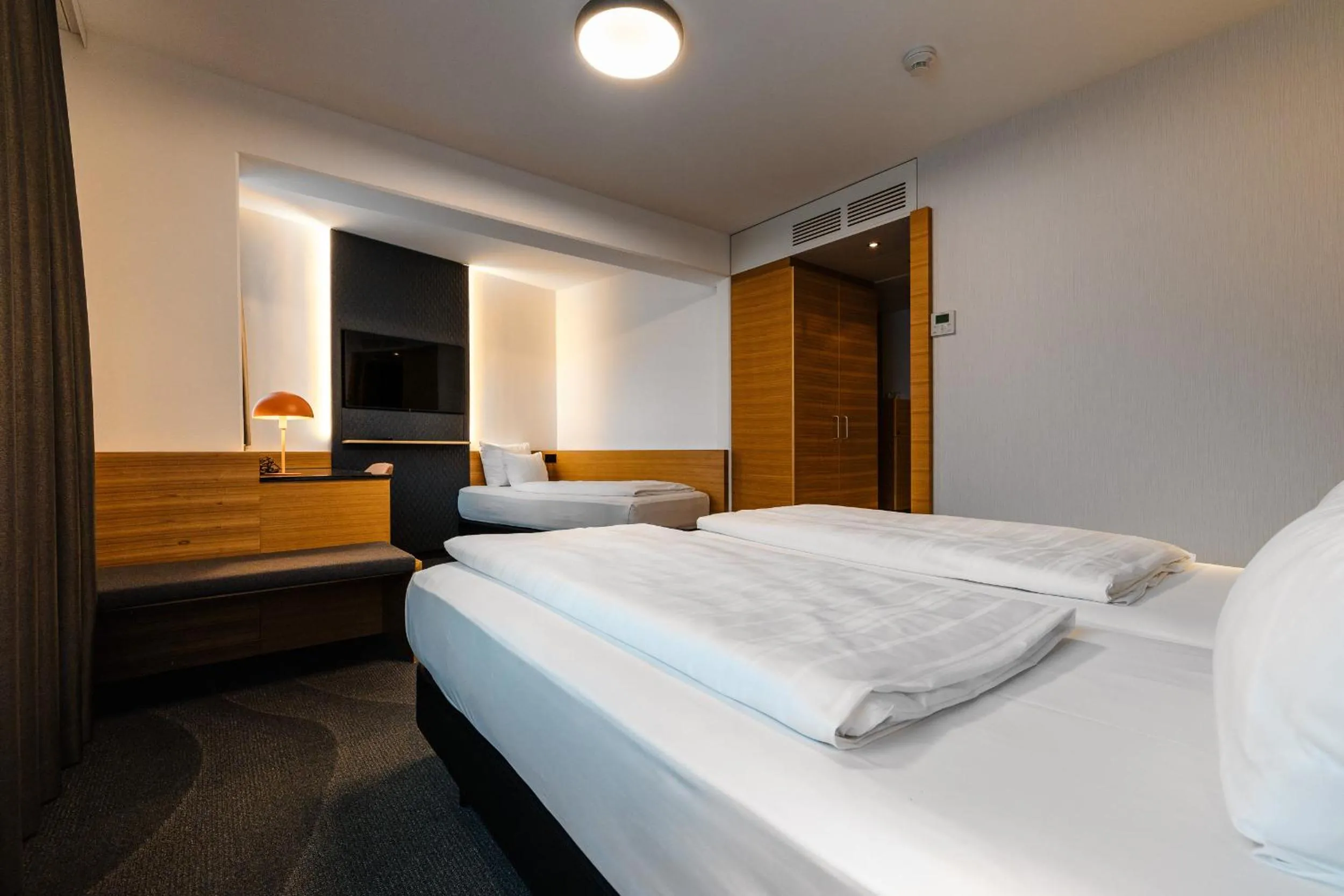 Bed in Alphotel Innsbruck