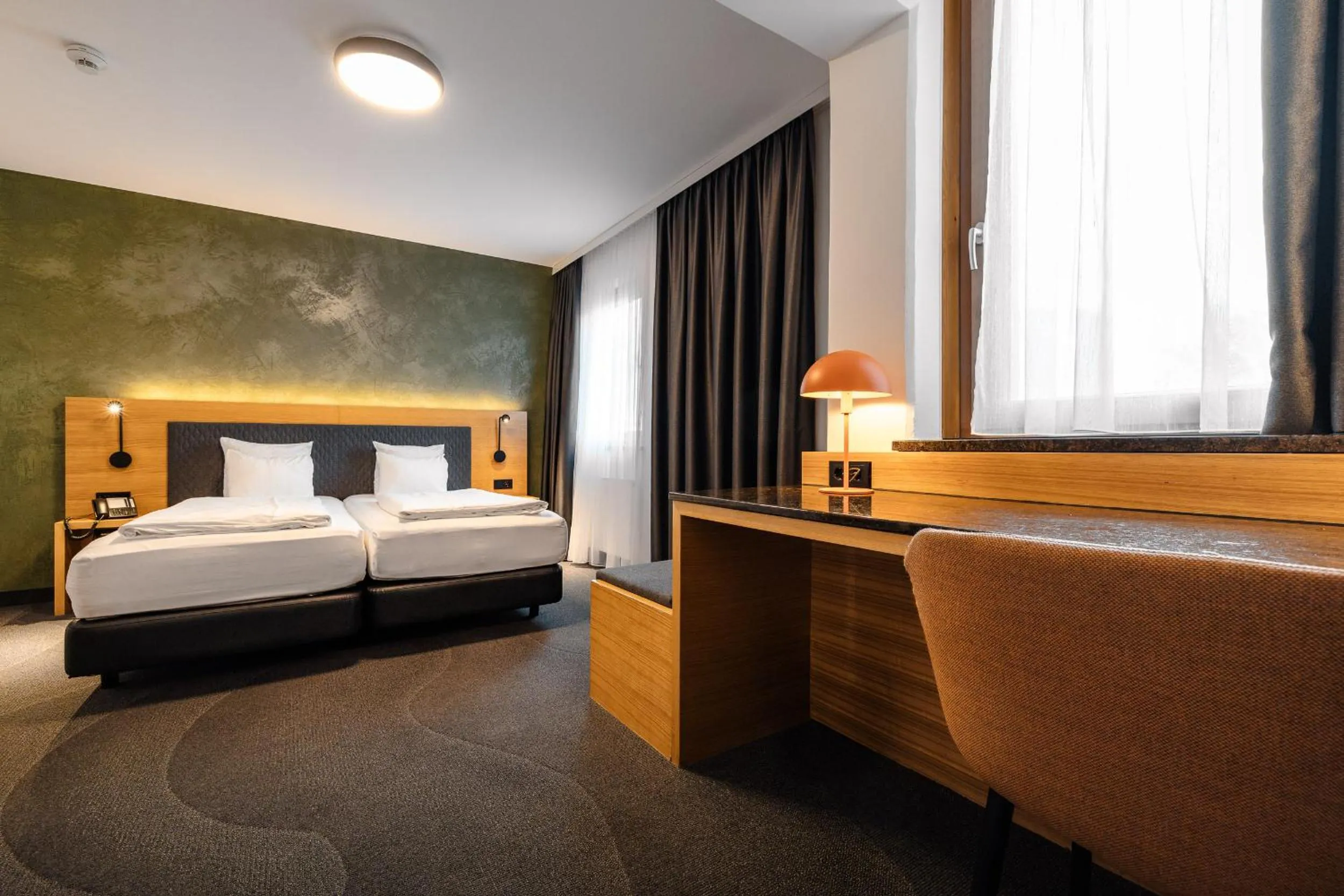 Bed in Alphotel Innsbruck