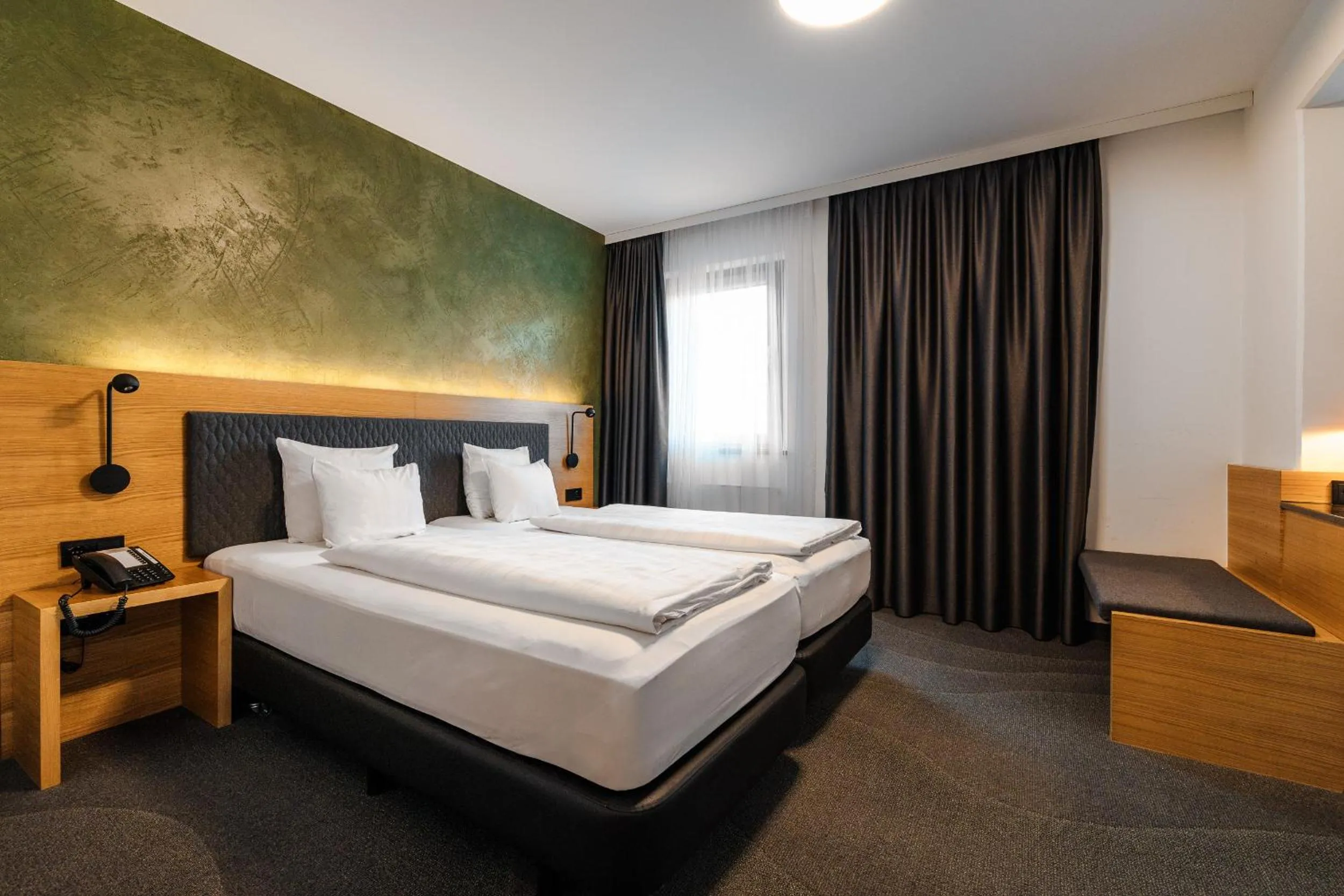 Bed in Alphotel Innsbruck