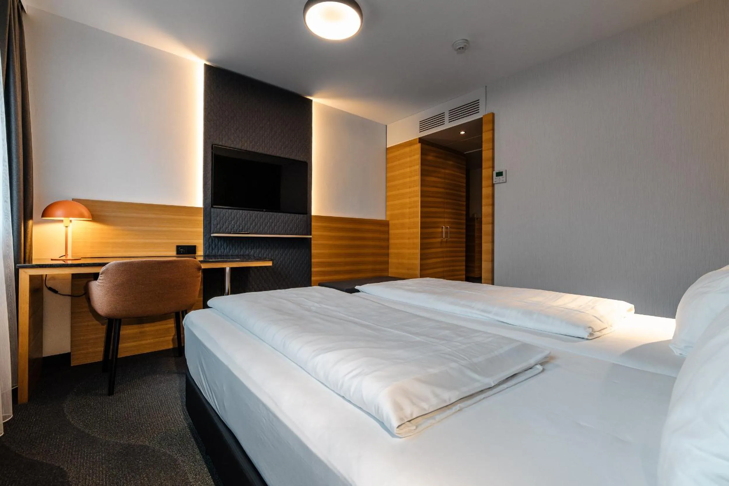 Bed in Alphotel Innsbruck