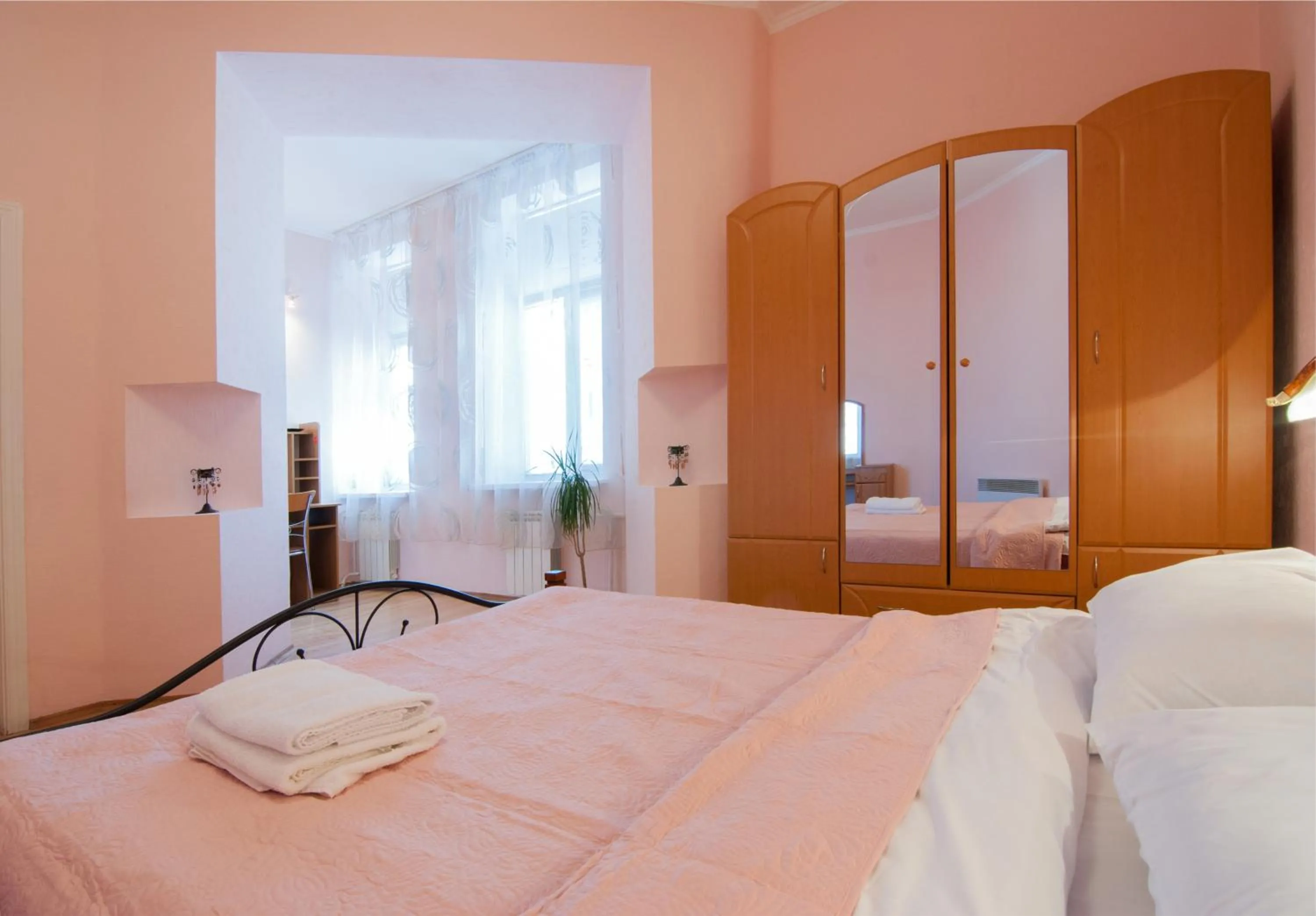 Bedroom, Bed in Home Hotel Apartments on Mykhailivska Square - Kiev