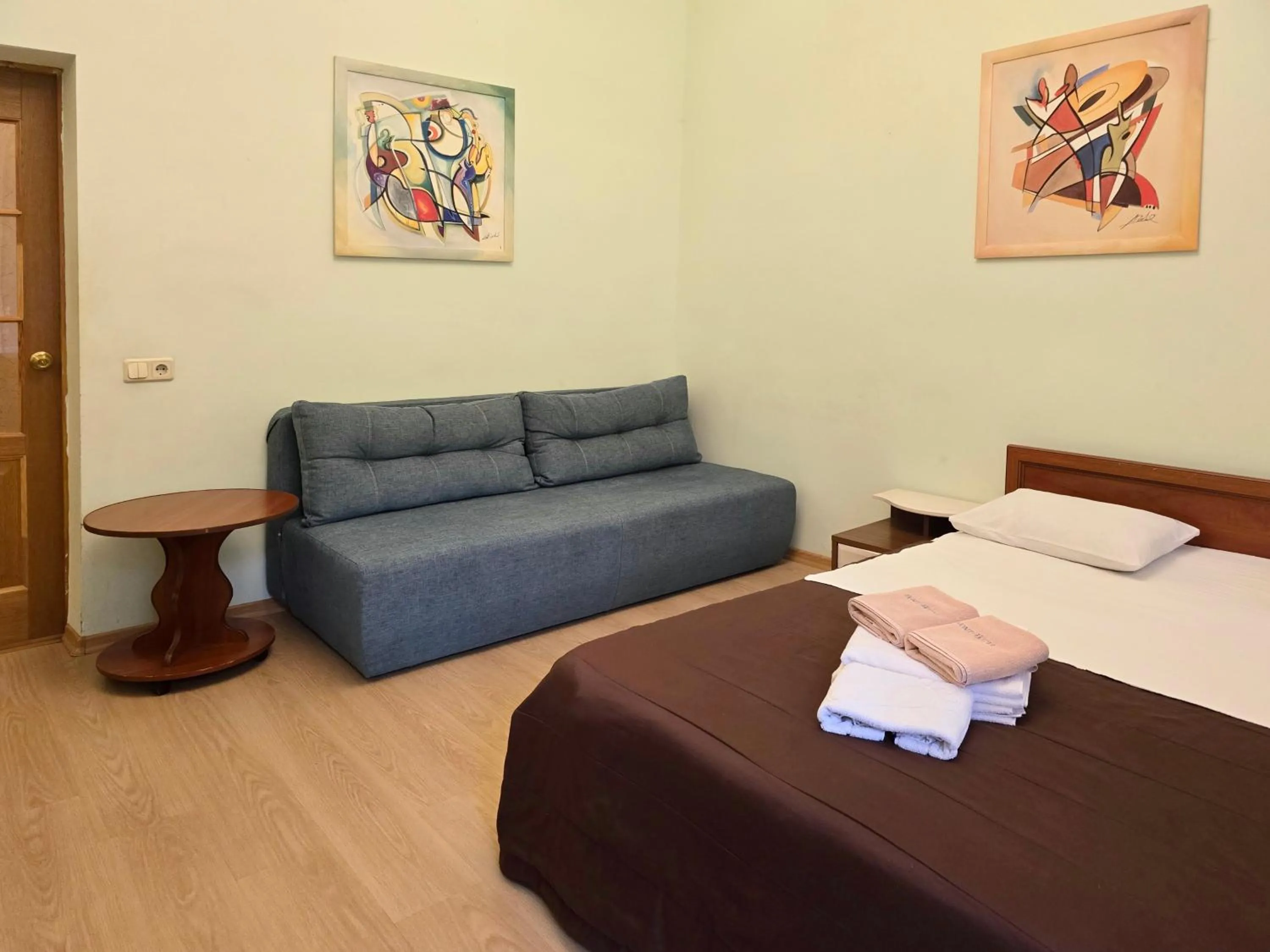 Living room, Bed in Home Hotel Apartments on Mykhailivska Square - Kiev