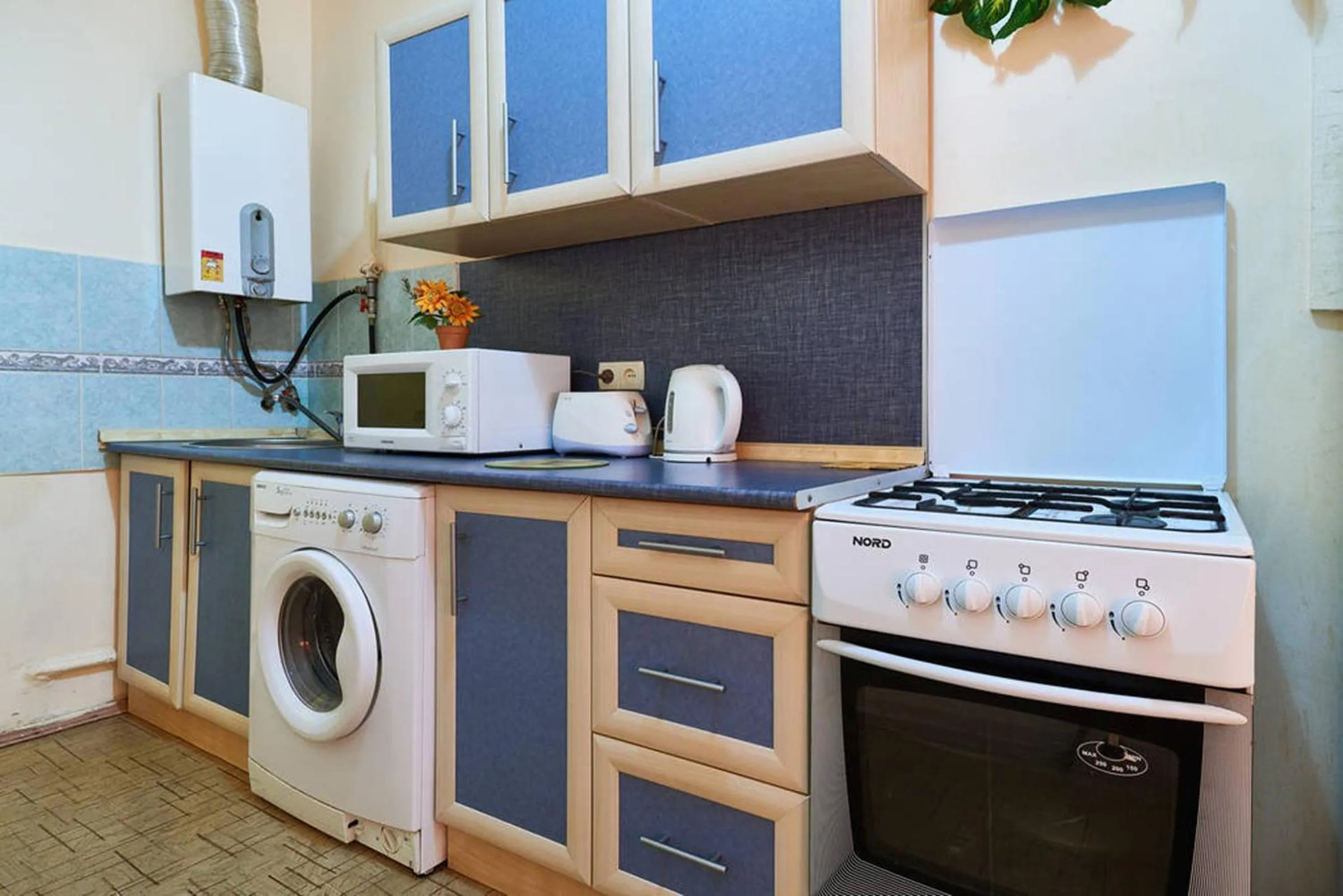 Kitchen or kitchenette in Home Hotel Apartments on Mykhailivska Square - Kiev