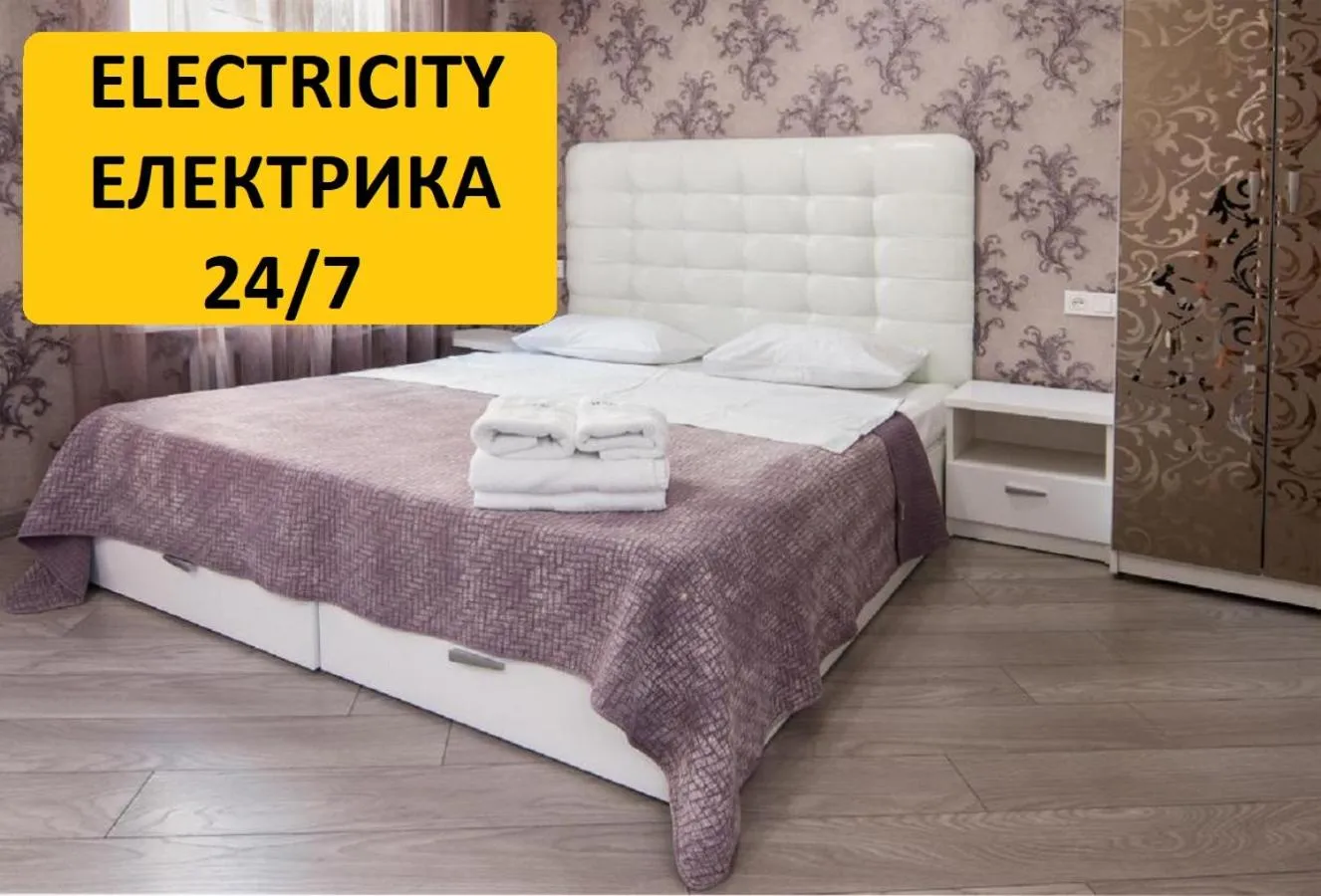 Photo of the whole room, Bed in Home Hotel Apartments on Mykhailivska Square - Kiev