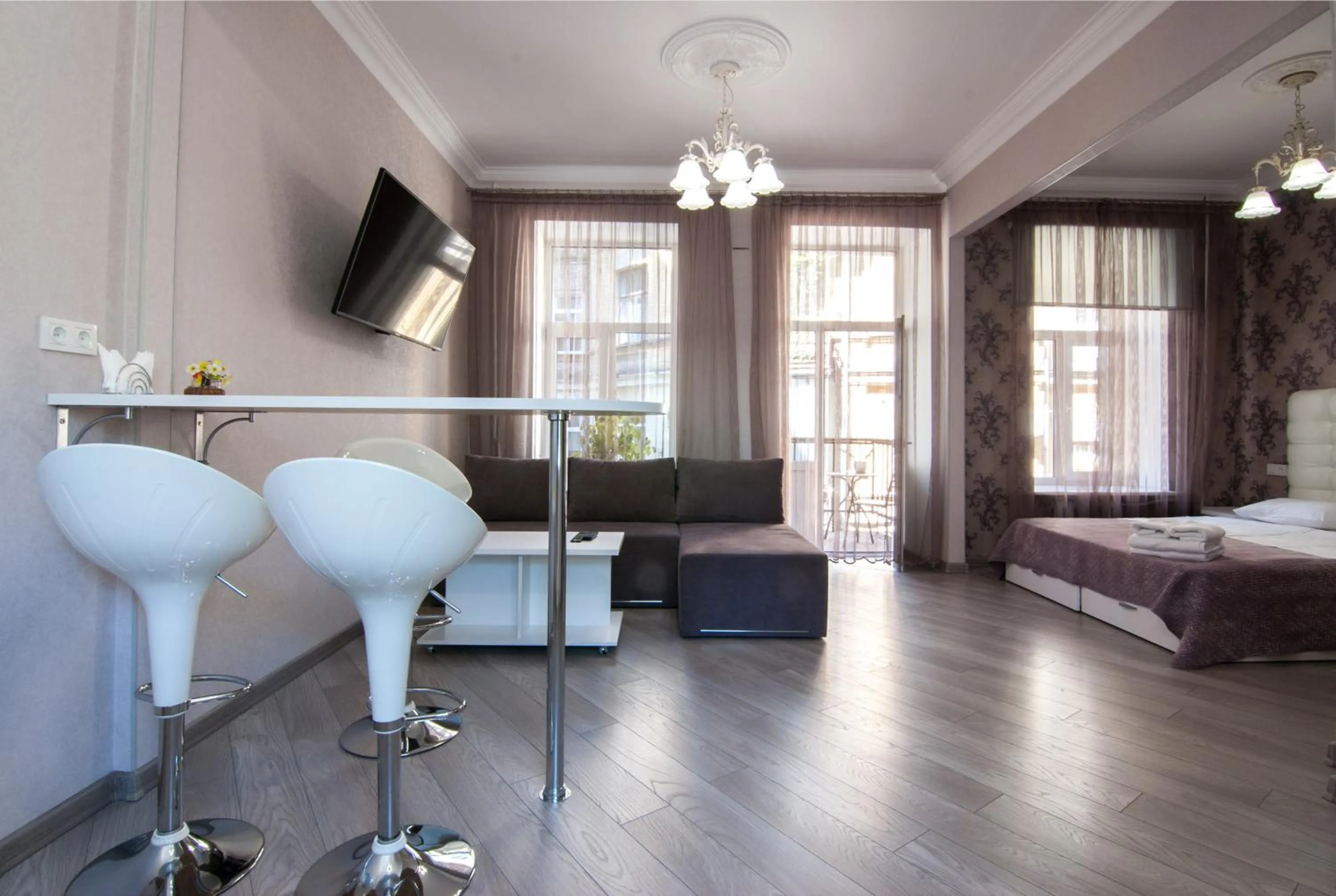 Photo of the whole room, Bed in Home Hotel Apartments on Mykhailivska Square - Kiev