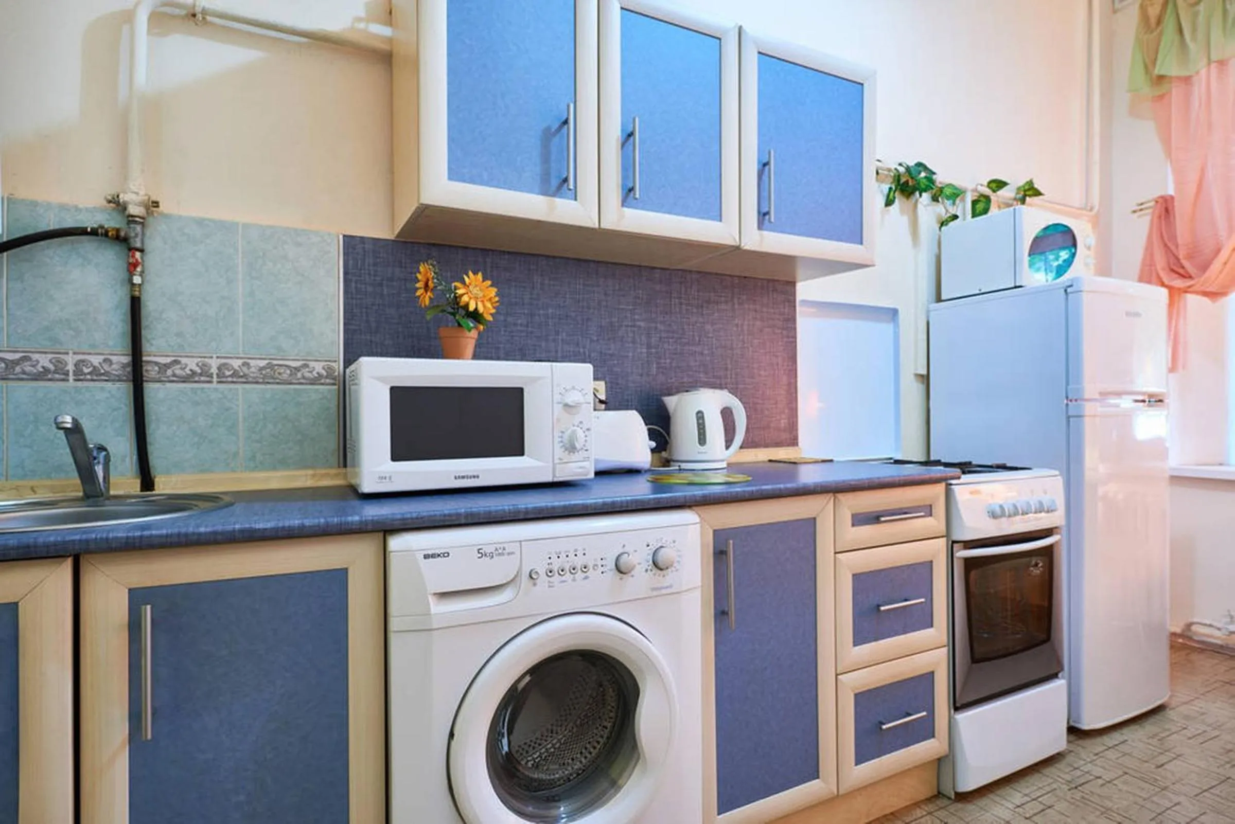 Kitchen or kitchenette in Home Hotel Apartments on Mykhailivska Square - Kiev