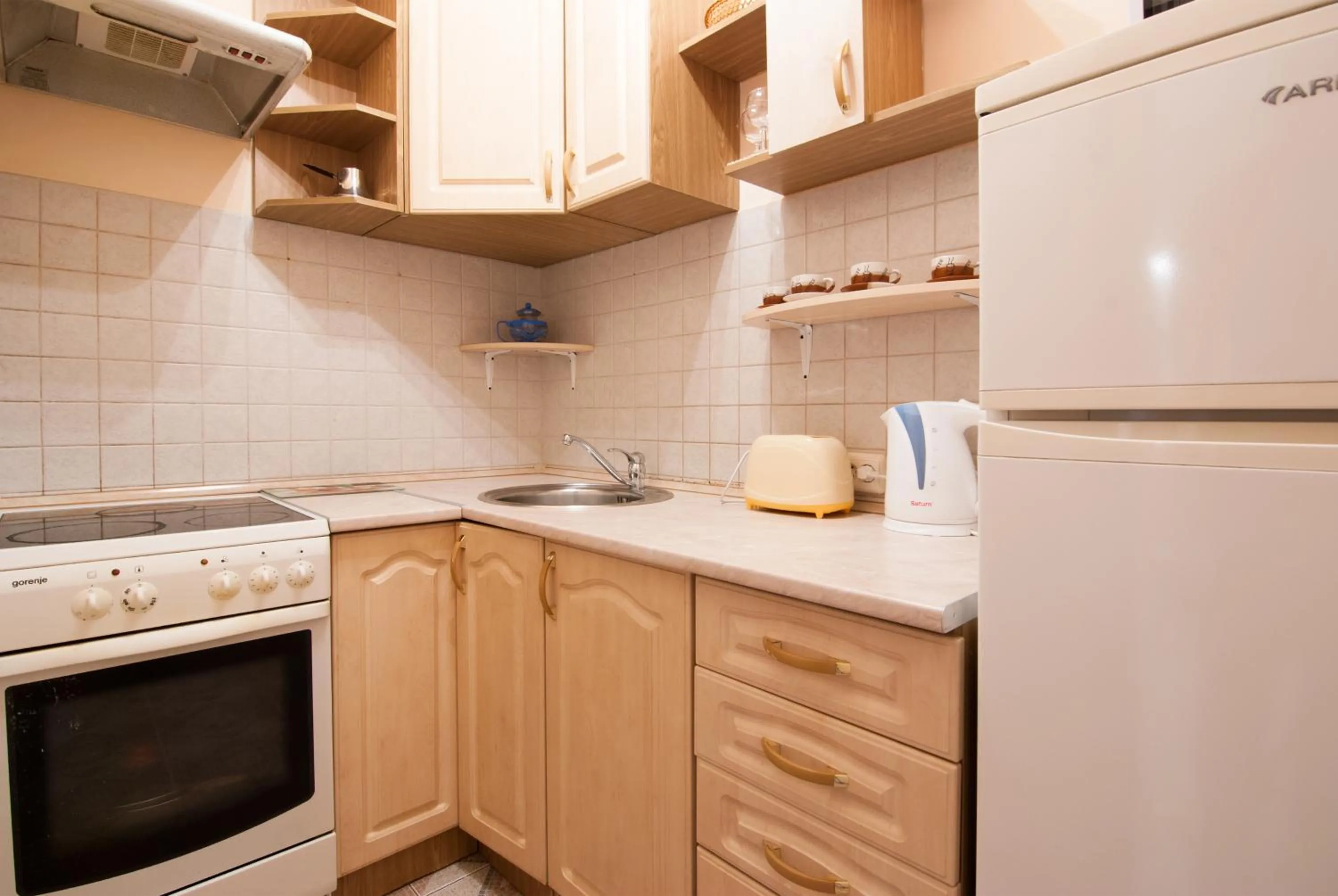 Kitchen or kitchenette in Home Hotel Apartments on Mykhailivska Square - Kiev