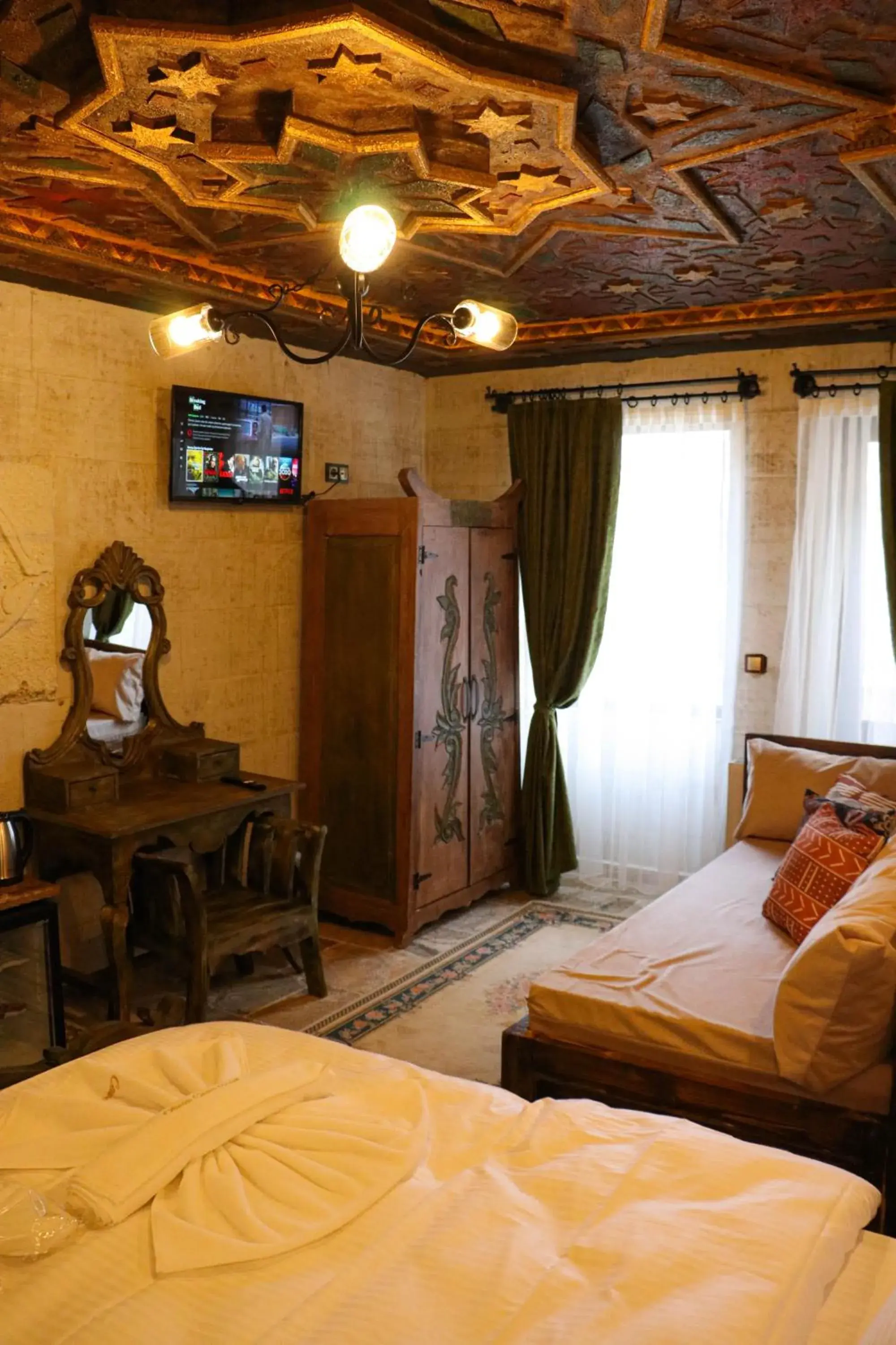 TV and multimedia, Bed in Olivia Cave Hotel TV and multimedia, Bed in Olivia Cave Hotel