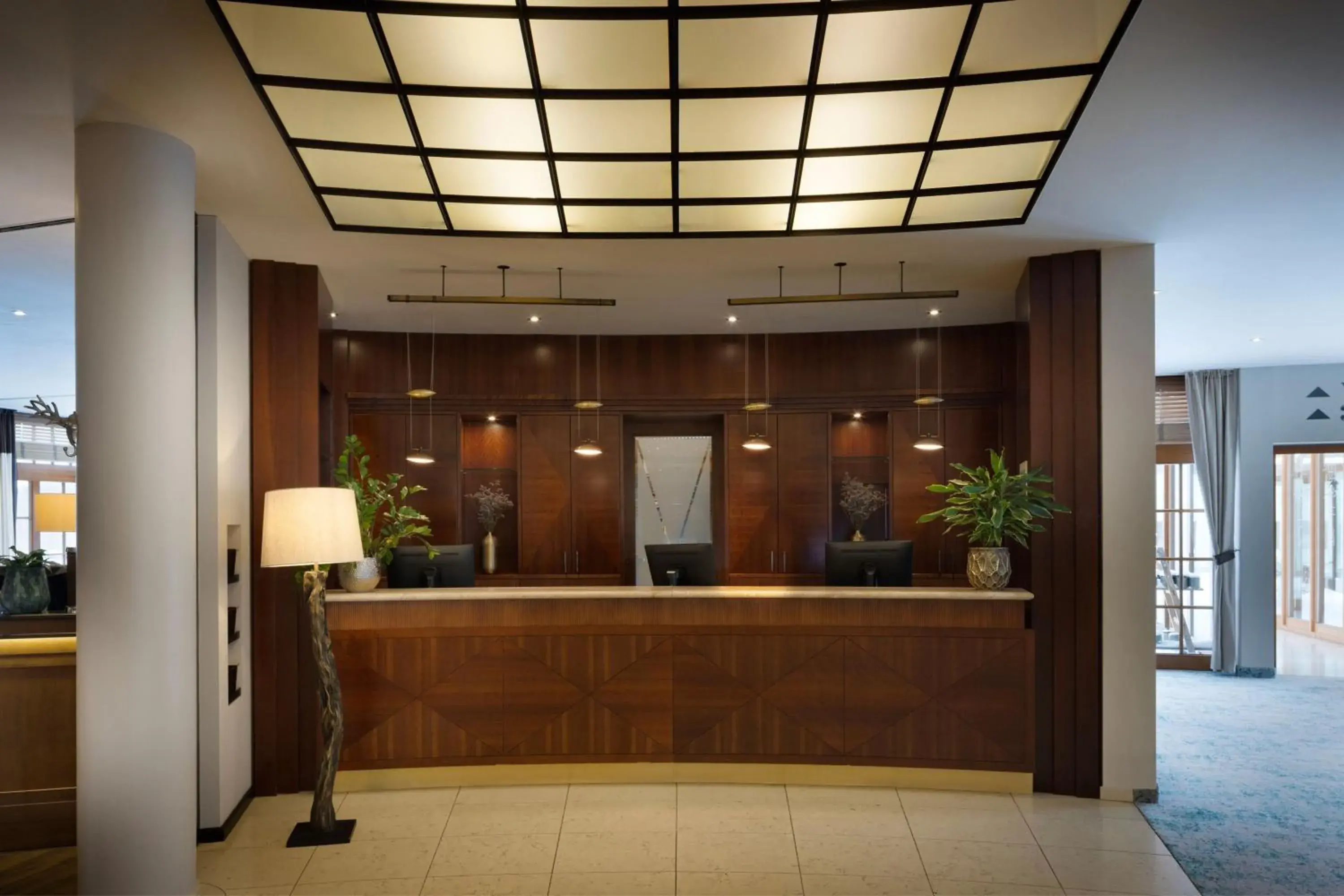 Lobby or reception in Arabella Jagdhof Resort am Fuschlsee, a Tribute Portfolio Hotel Lobby or reception in Arabella Jagdhof Resort am Fuschlsee, a Tribute Portfolio Hotel